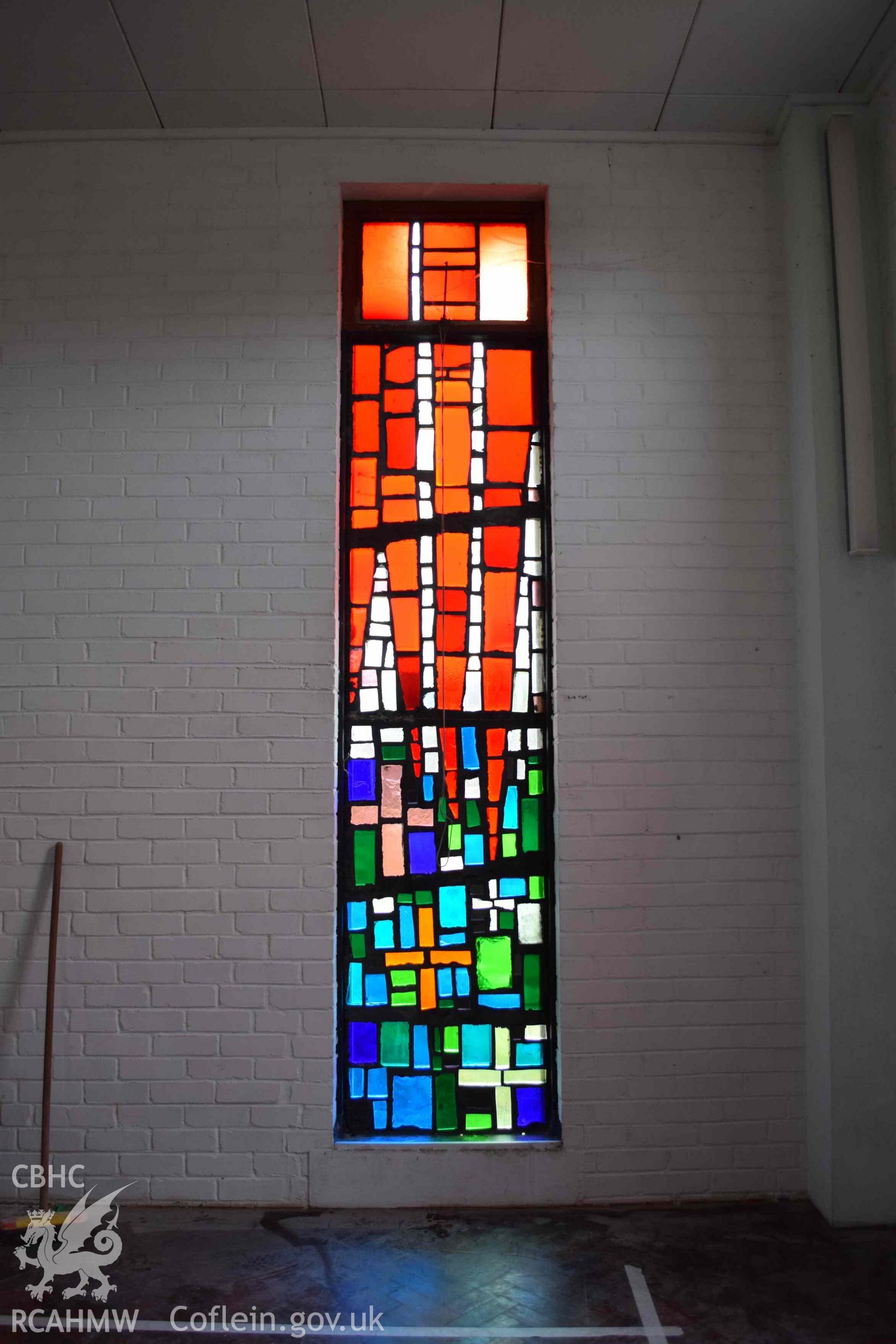 Photograph showing a Jonah Jones Dalle de Verre window (9a), at the church of The Resurrection of Our Saviour, Morfa Nefyn, taken on behalf of the Architectural Glass Centre during the removal of the windows in March 2019.