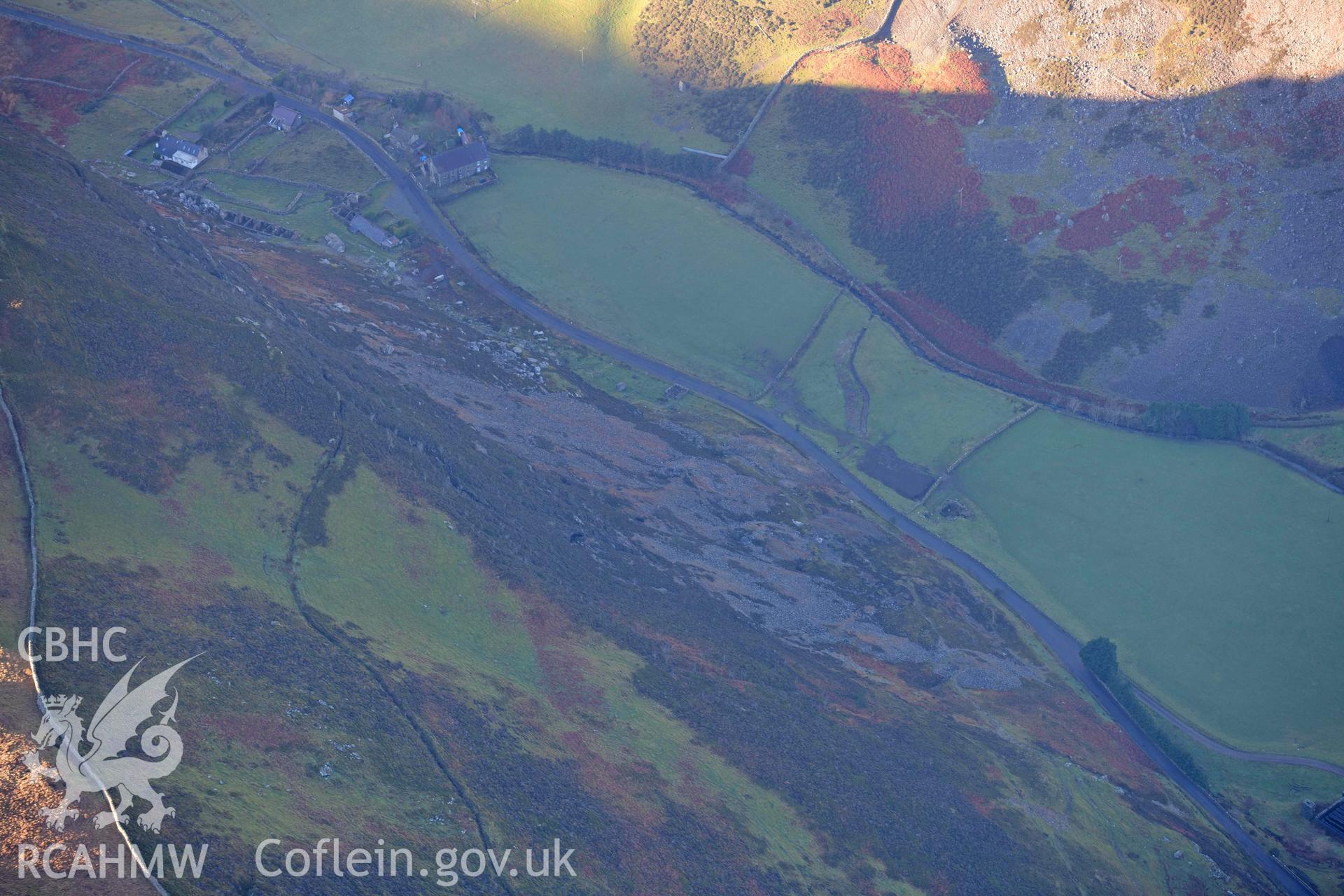 Oblique aerial photograph of Drws y Coed copper mine taken during the Royal Commission