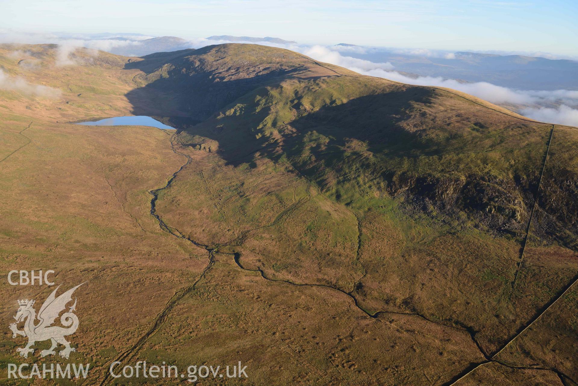 Oblique aerial photograph of Pont Scethin landscape taken from the south west during the Royal Commission’s programme of archaeological aerial reconnaissance by Toby Driver on 12th January 2022