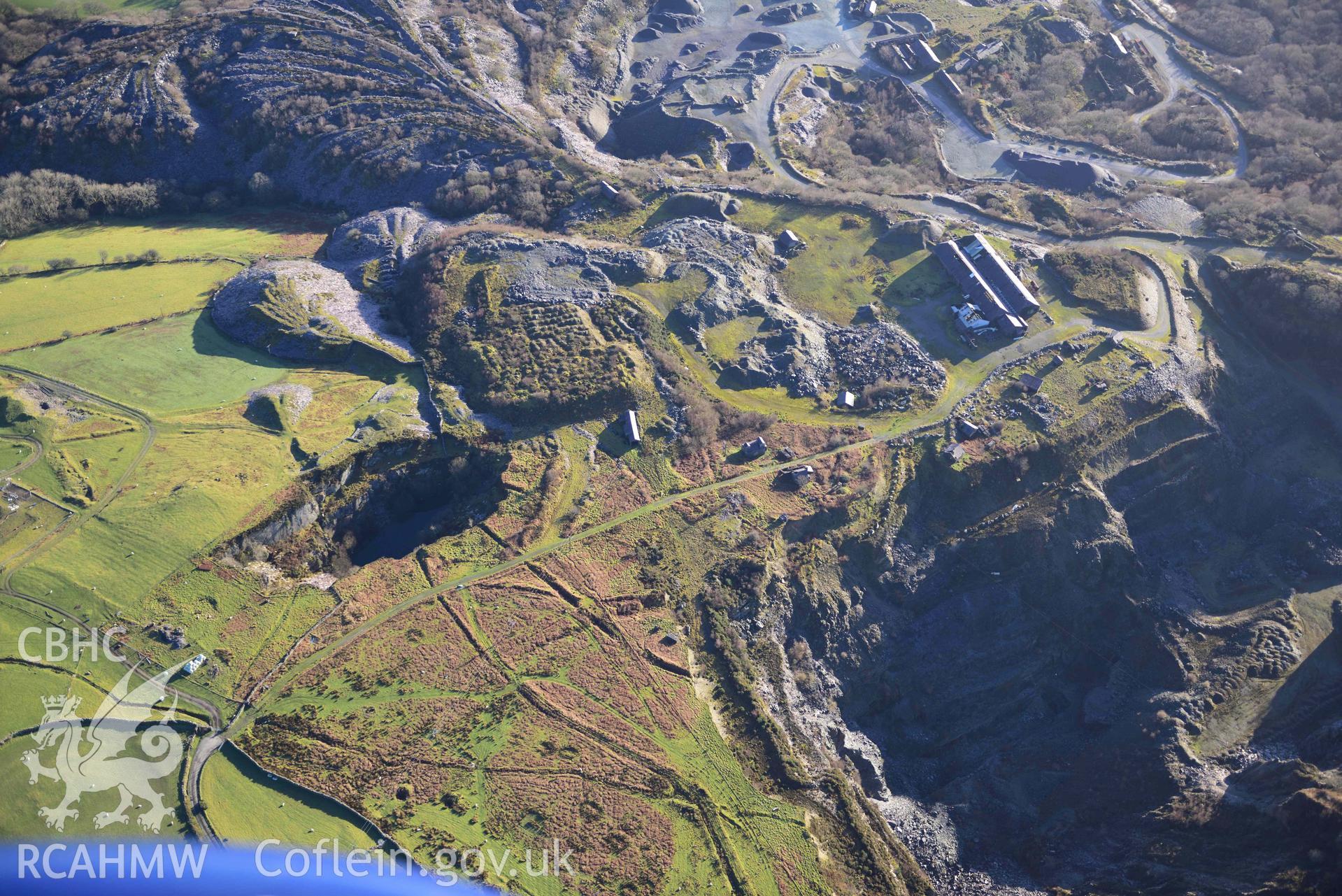 Oblique aerial photograph of Pen yr Orsedd slate quarry taken during the Royal Commission