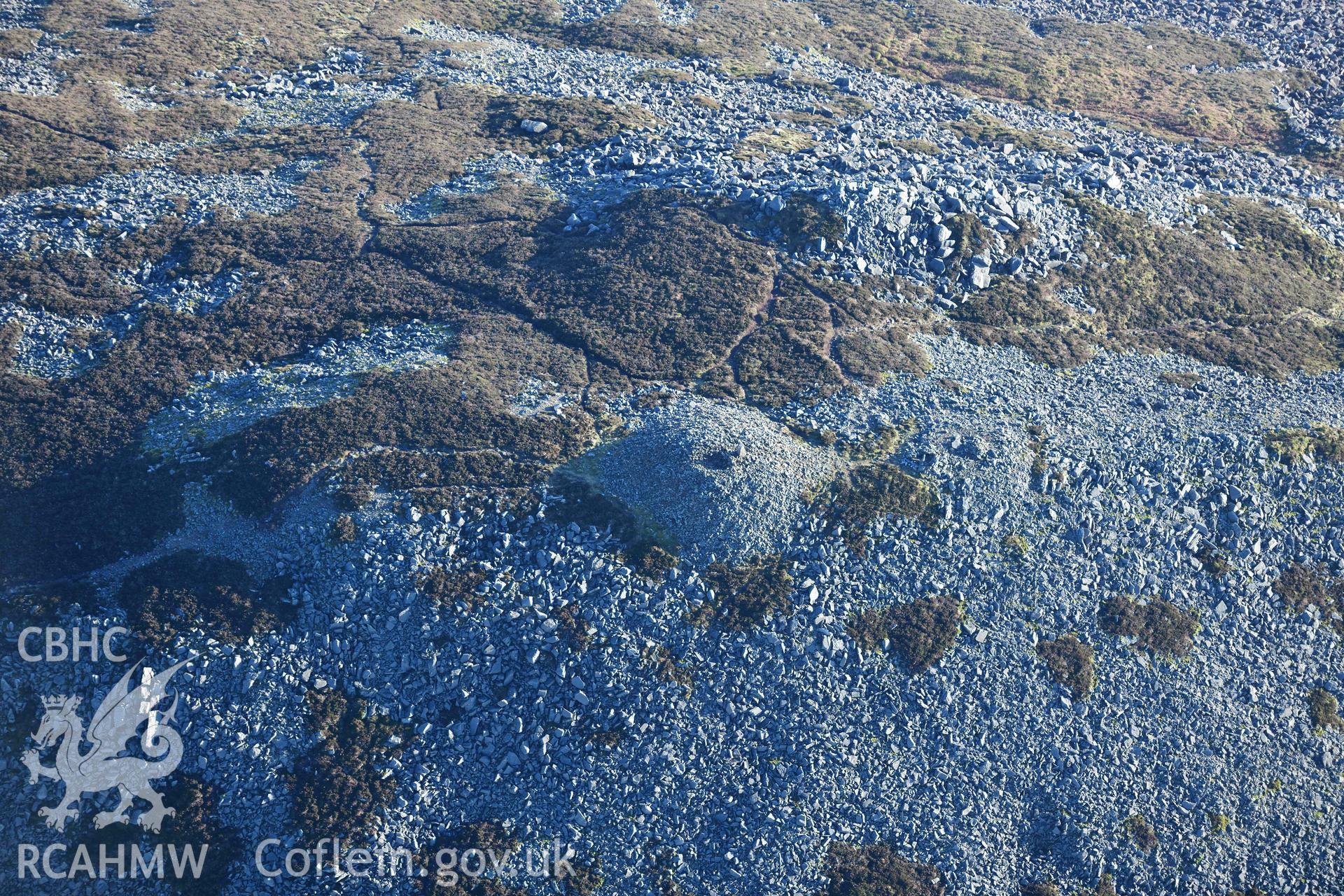 Oblique aerial photograph of Yr Eiffl summit cairn taken during the Royal Commission