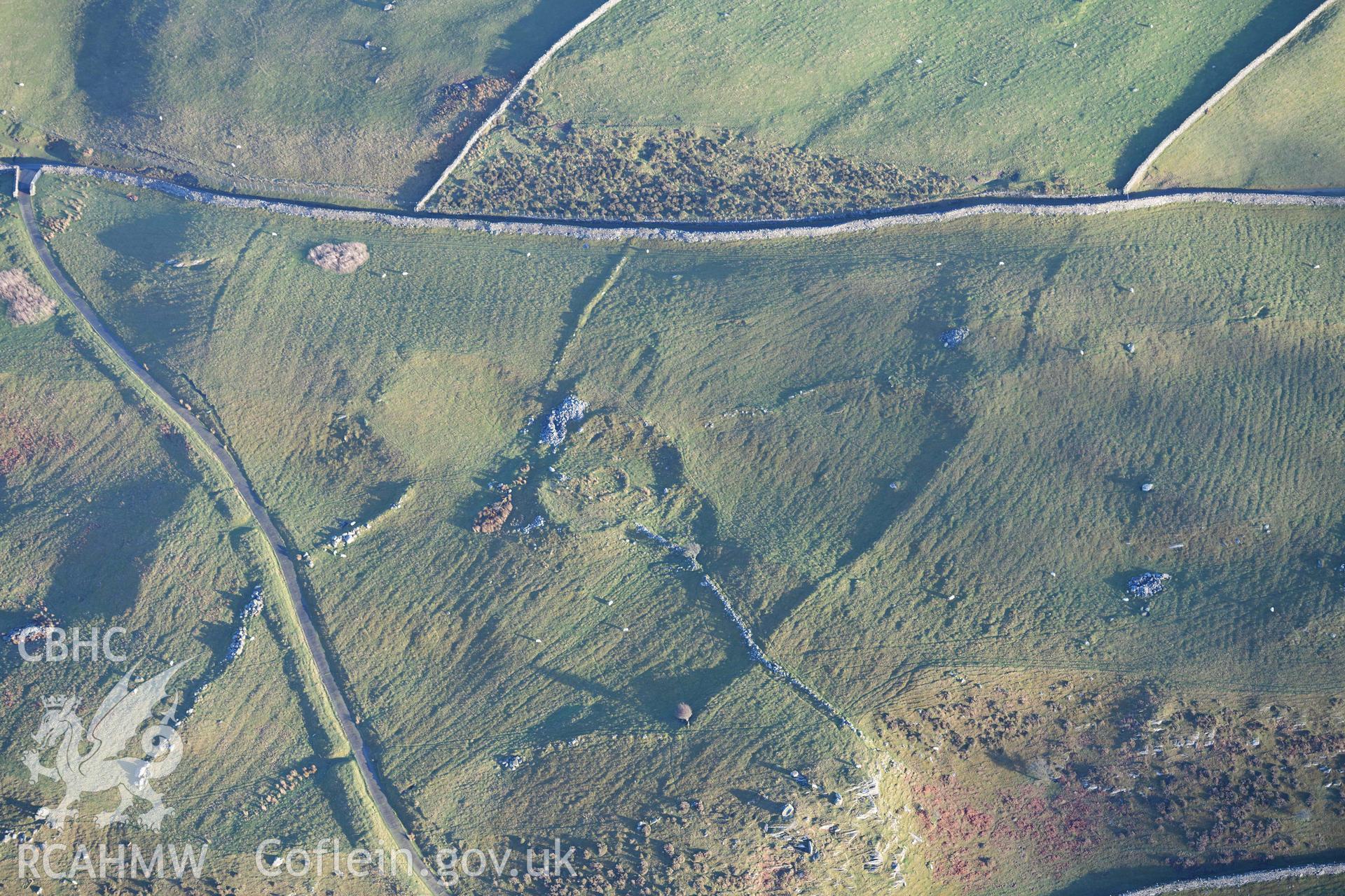 Oblique aerial photograph of Erw Wen prehistoric and medieval settlement, and fields. Taken during the Royal Commission