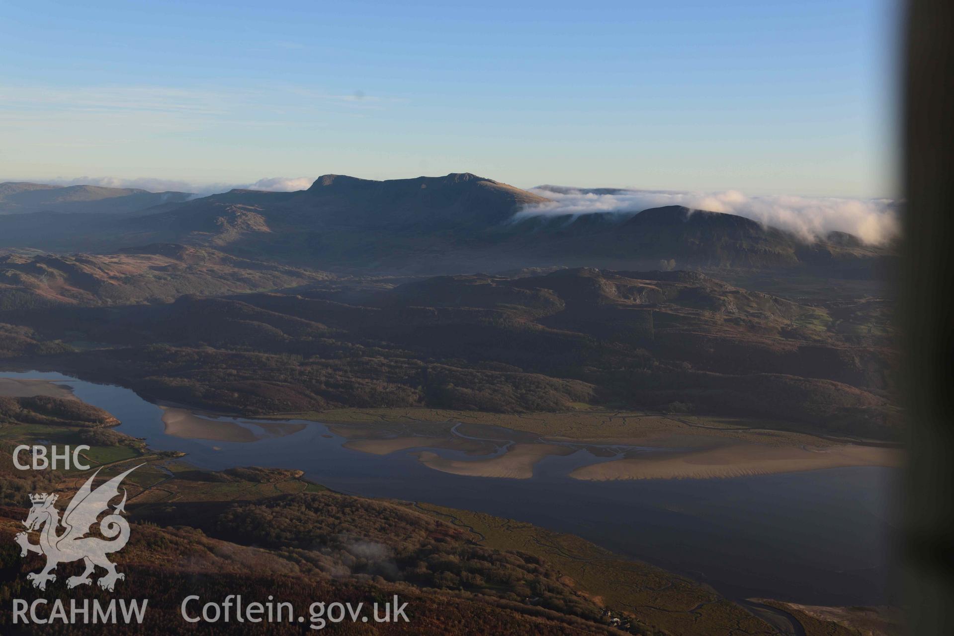 Oblique aerial photograph of Cader Idris, with cloud inversion, wide landscape from NW. Taken during the Royal Commission