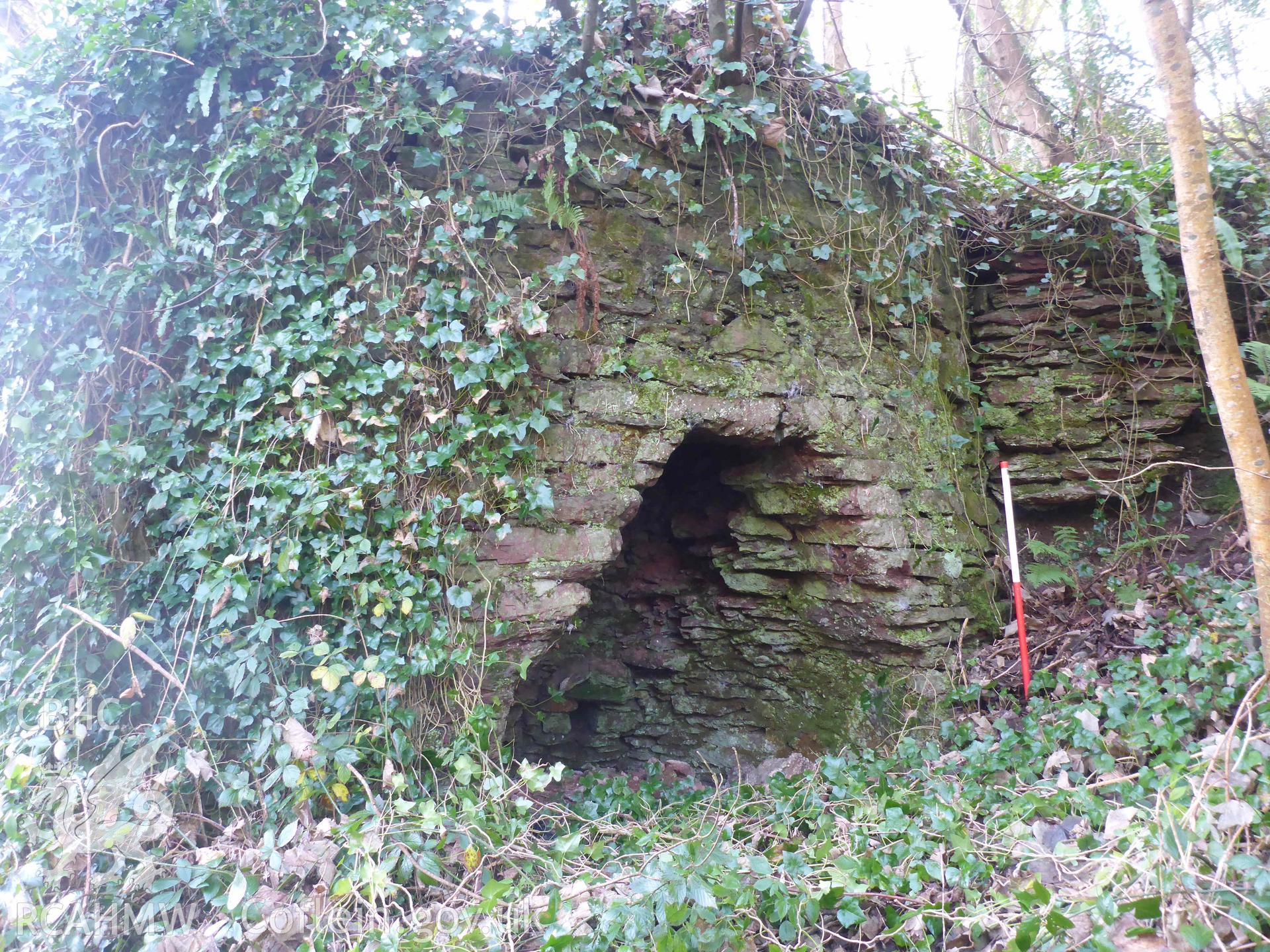 Castle Pill Lime Kiln, northern kiln-eye and remains of adjacent retaining wall. Scale is 1m.