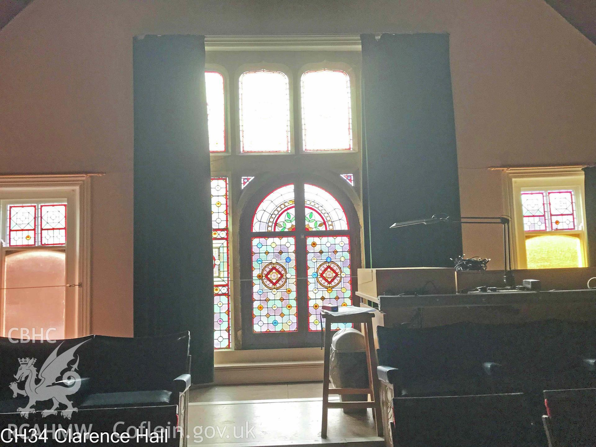 Photograph of The Clarence Hall, Crickhowell - interior, stained glass window, taken in 2019.