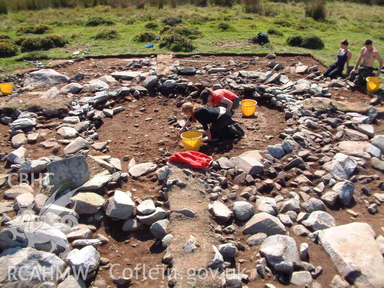 Photograph showing Egryn excavated hut circle site, taken by John Latham, 2004.