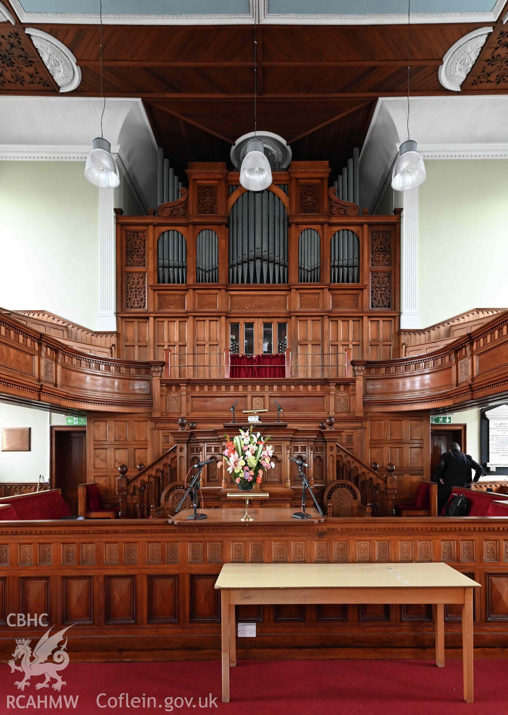 Capel Moreia, interior looking east towards pulpit, sedd fawr, and organ.