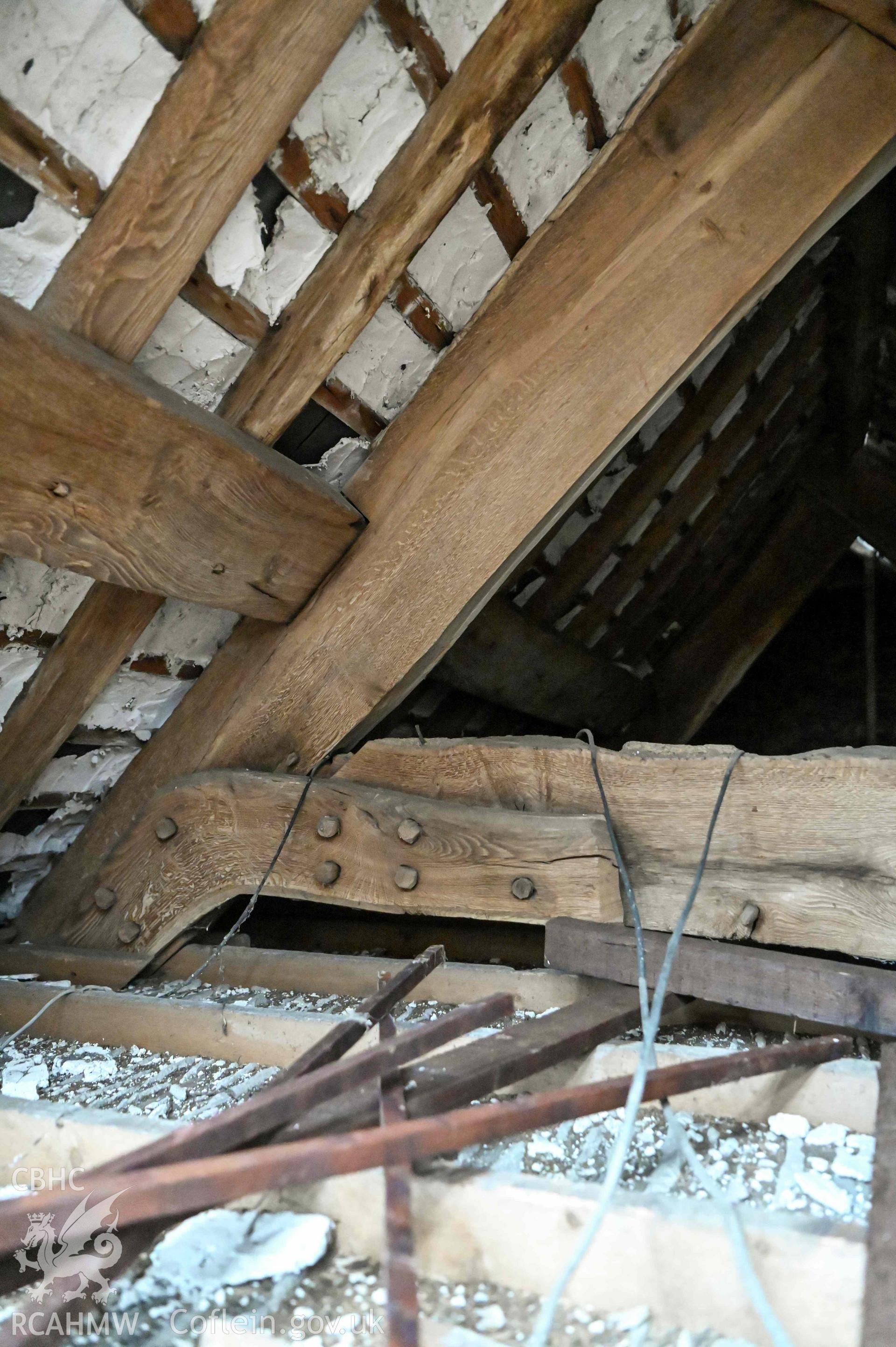Tyddyn Mawr, interior roof looking north-east showing detail of (originally) upper part of pegged truss construction.