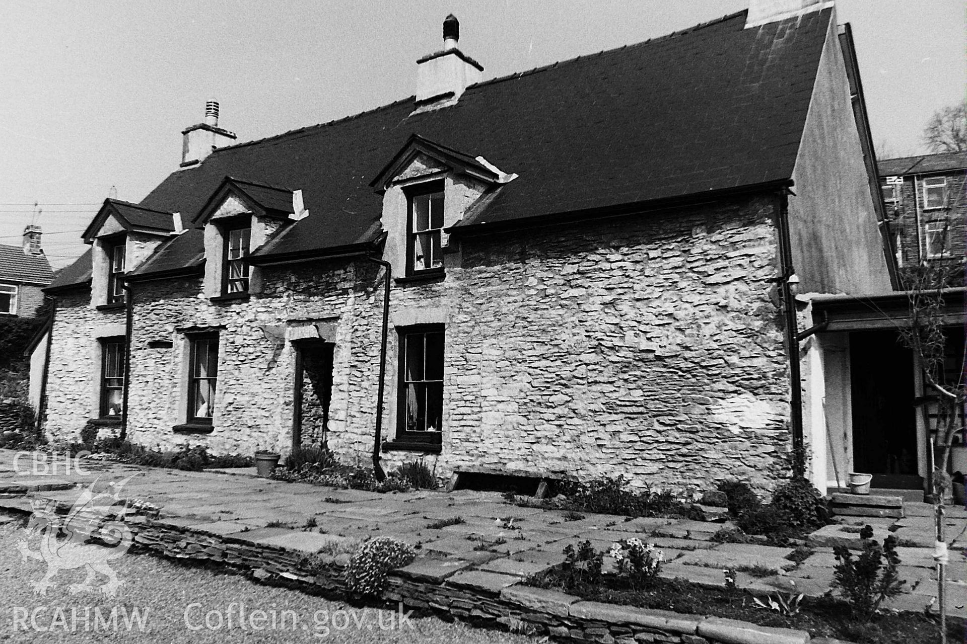 Digitised black and white photograph showing front elevation of Troedrhiwtrwyn farmhouse, produced by Paul Davis in 1985