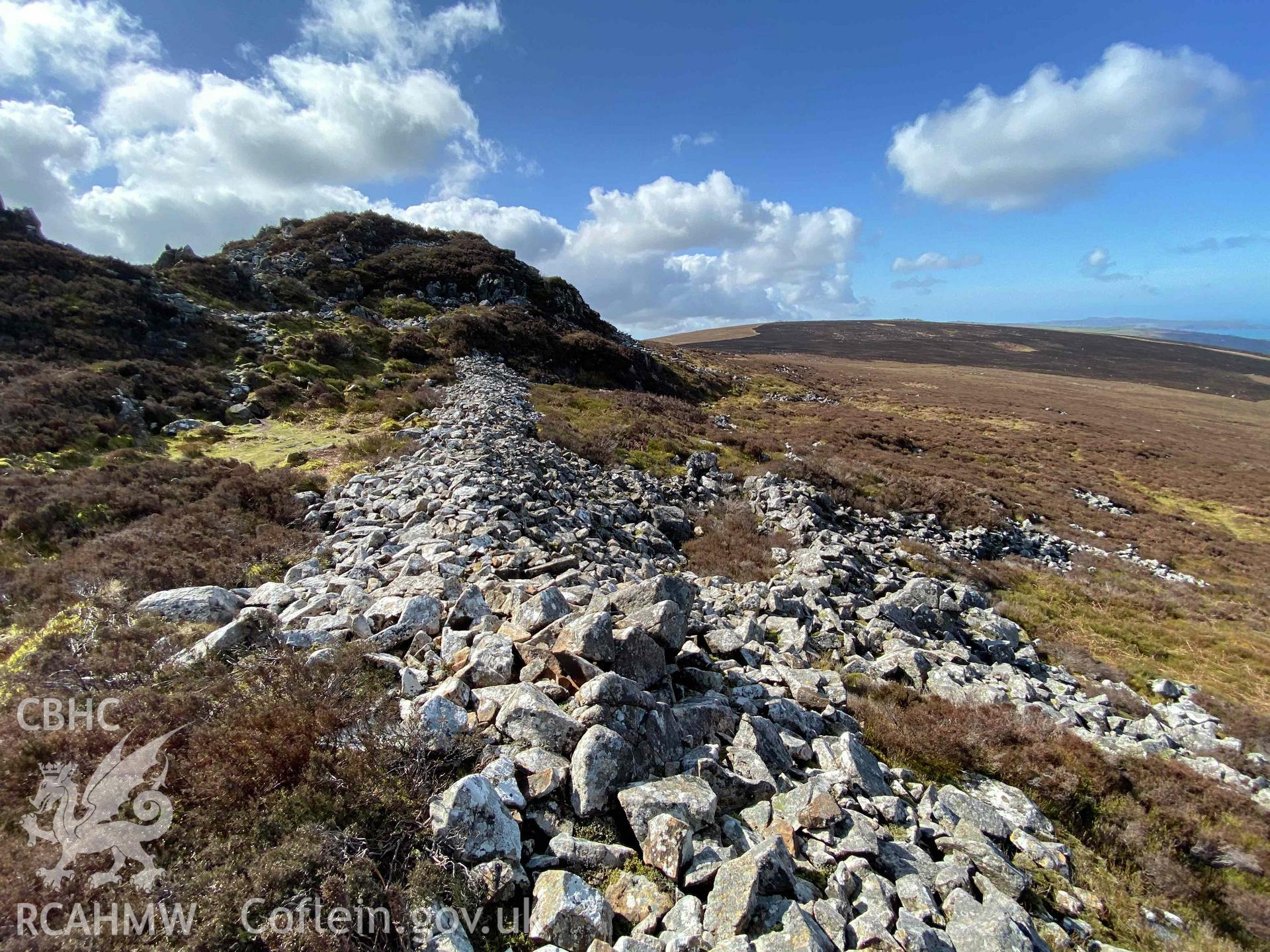 Digital photograph showing general view of drystone wall at Carn Ingli camp, produced by Paul Davis in 2020