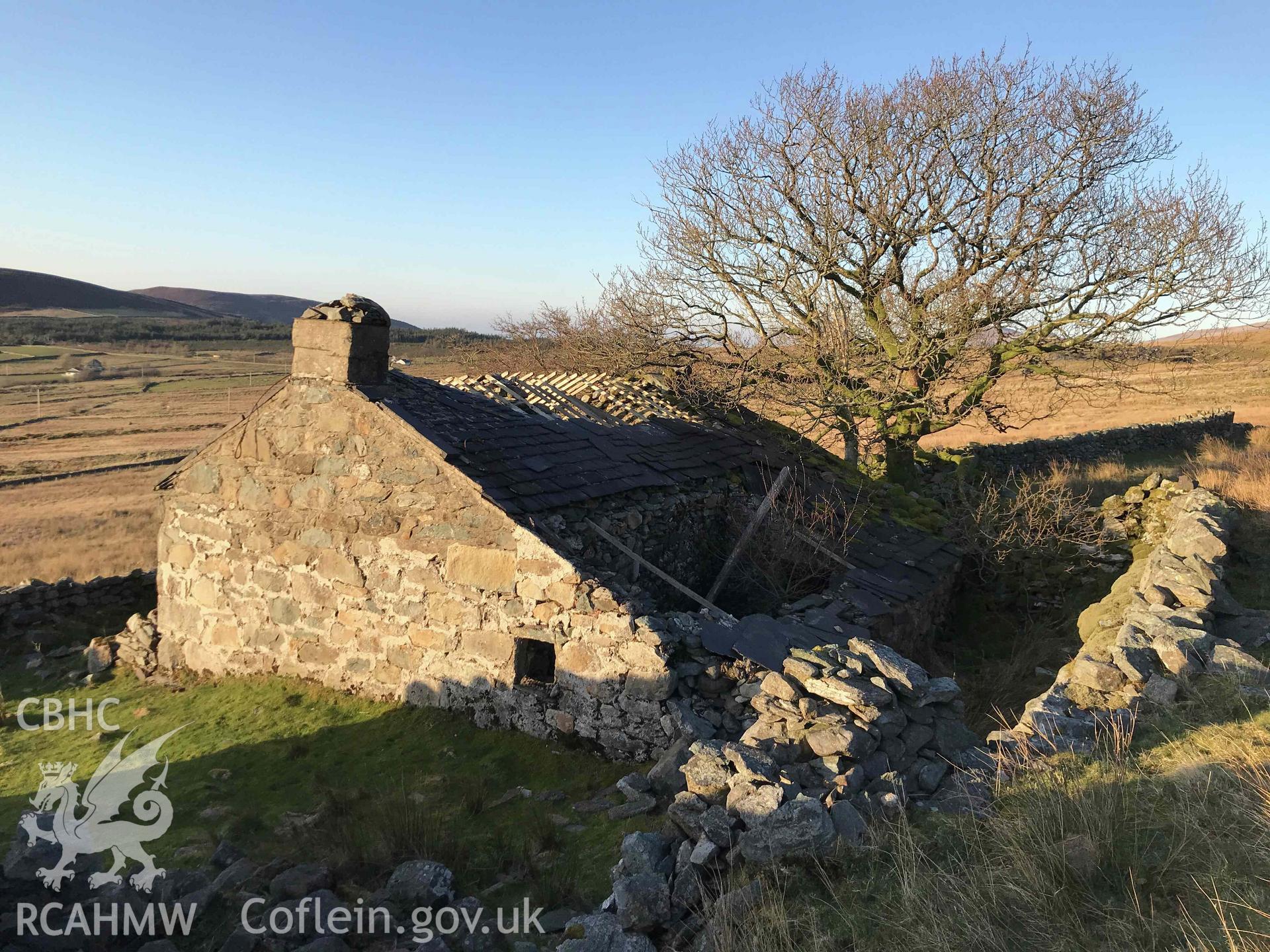 Digital photograph showing side elevation and collapsed roof of Bryn-brith, a cottage at Dinorwig deserted settlement, produced by Paul Davis in 2020