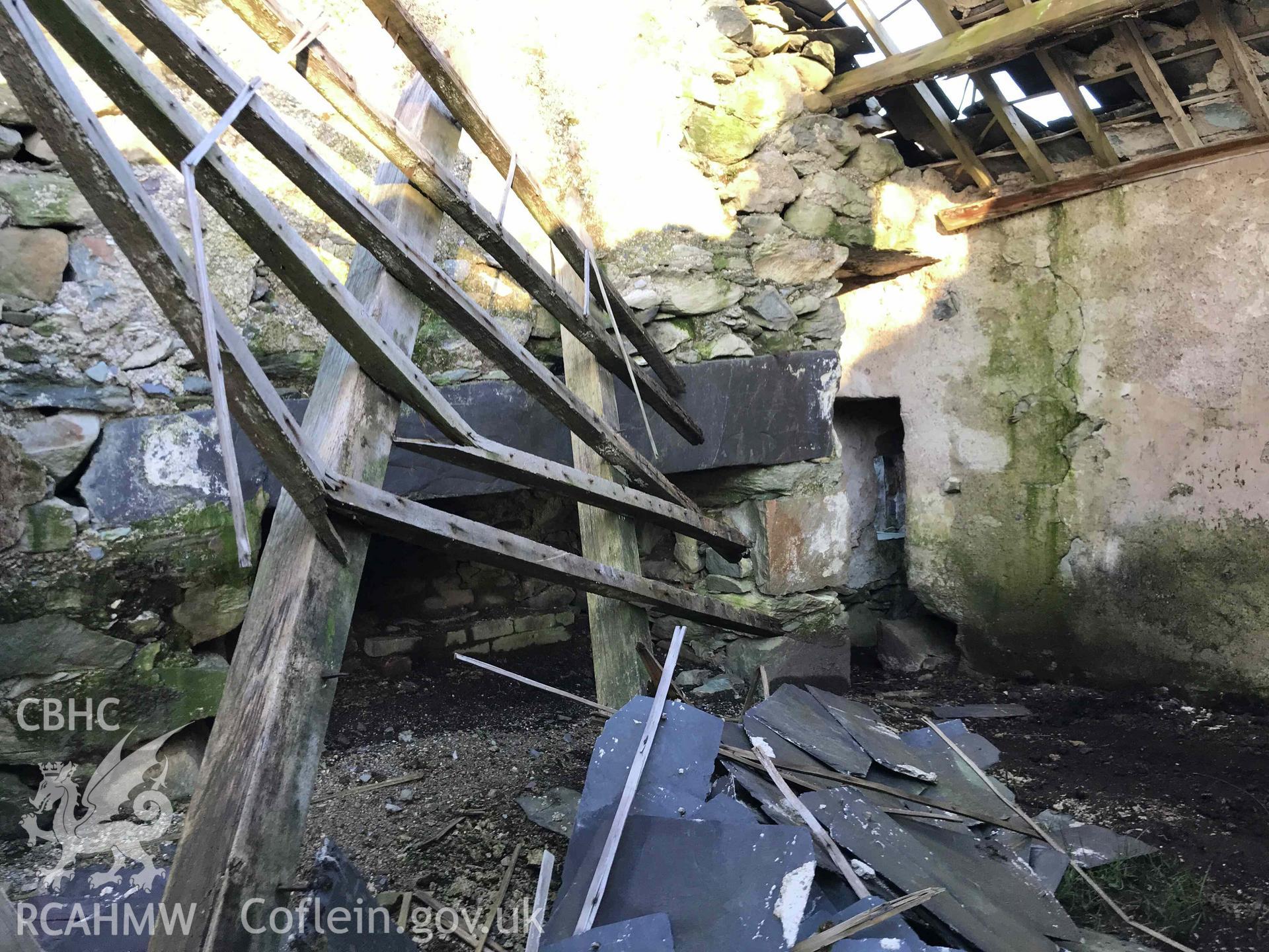 Digital photograph showing interior (including hearth and collapsed roof) of Cae'r Gors, a cottage at Dinorwig deserted settlement, produced by Paul Davis in 2020