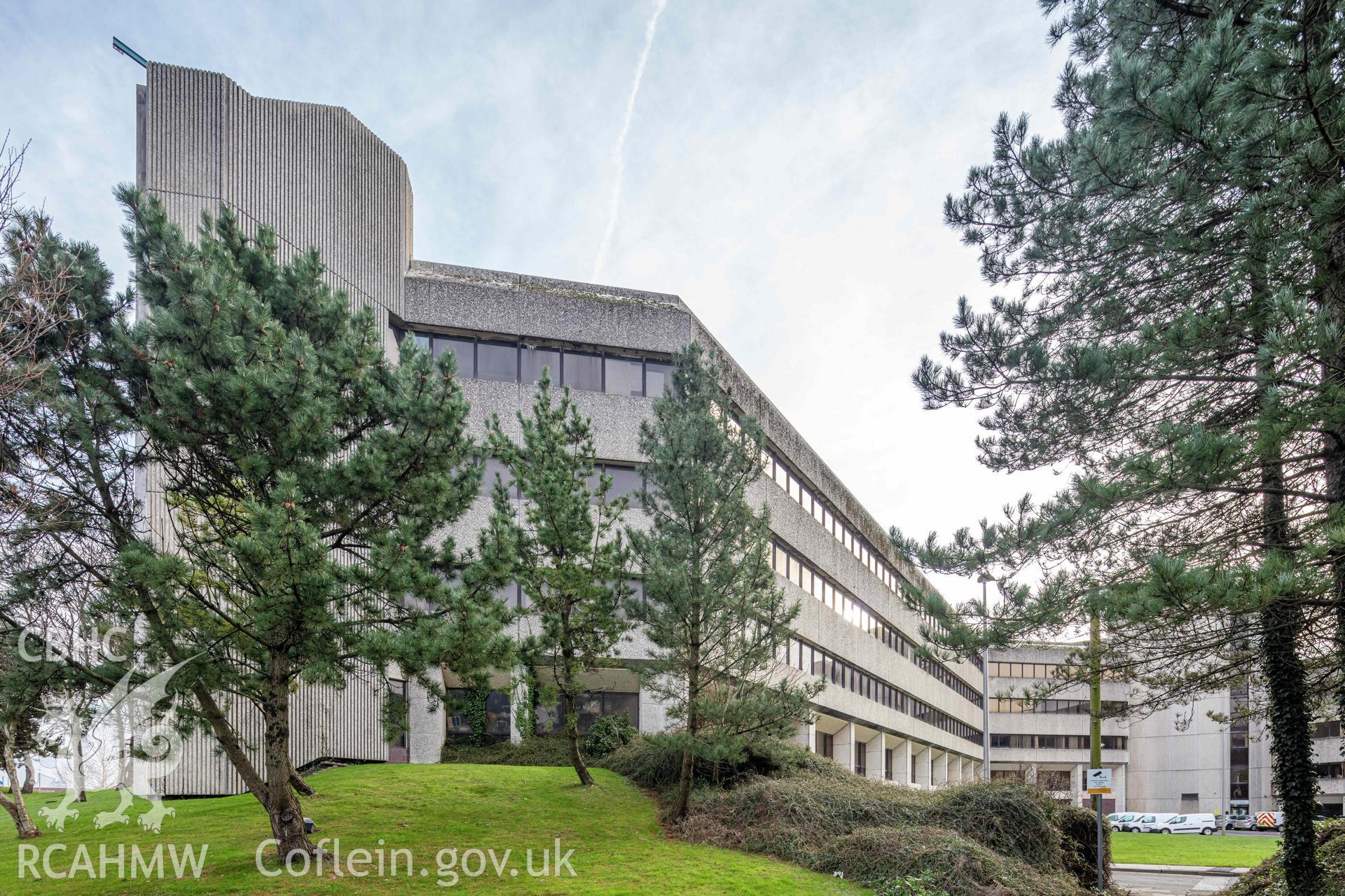 Digital colour photograph showing external view of Swansea Civic Centre taken by Derek Phillips for RCAHMW in 2022 - North Wing from road.