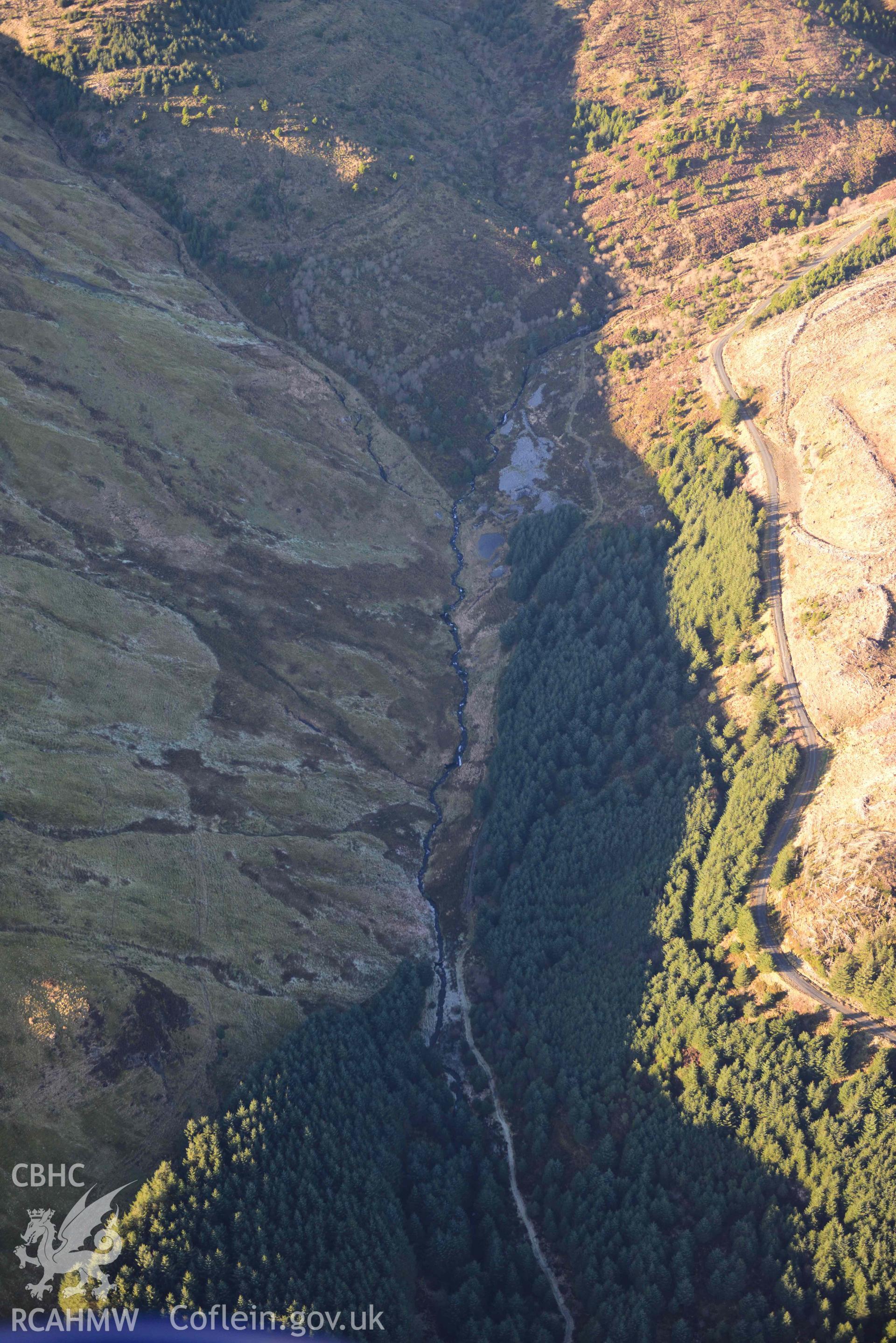 Oblique aerial photograph of Nant yr Eira mine from the east. Taken during the Royal Commission’s programme of archaeological aerial reconnaissance by Toby Driver on 17th January 2022