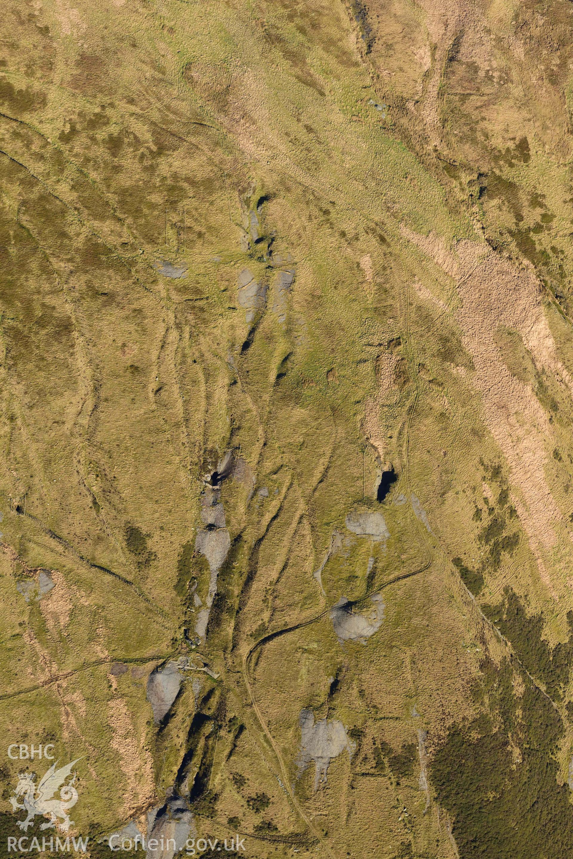 Oblique aerial photograph of Copa Hill taken during the Royal Commission’s programme of archaeological aerial reconnaissance by Toby Driver on 17th January 2022