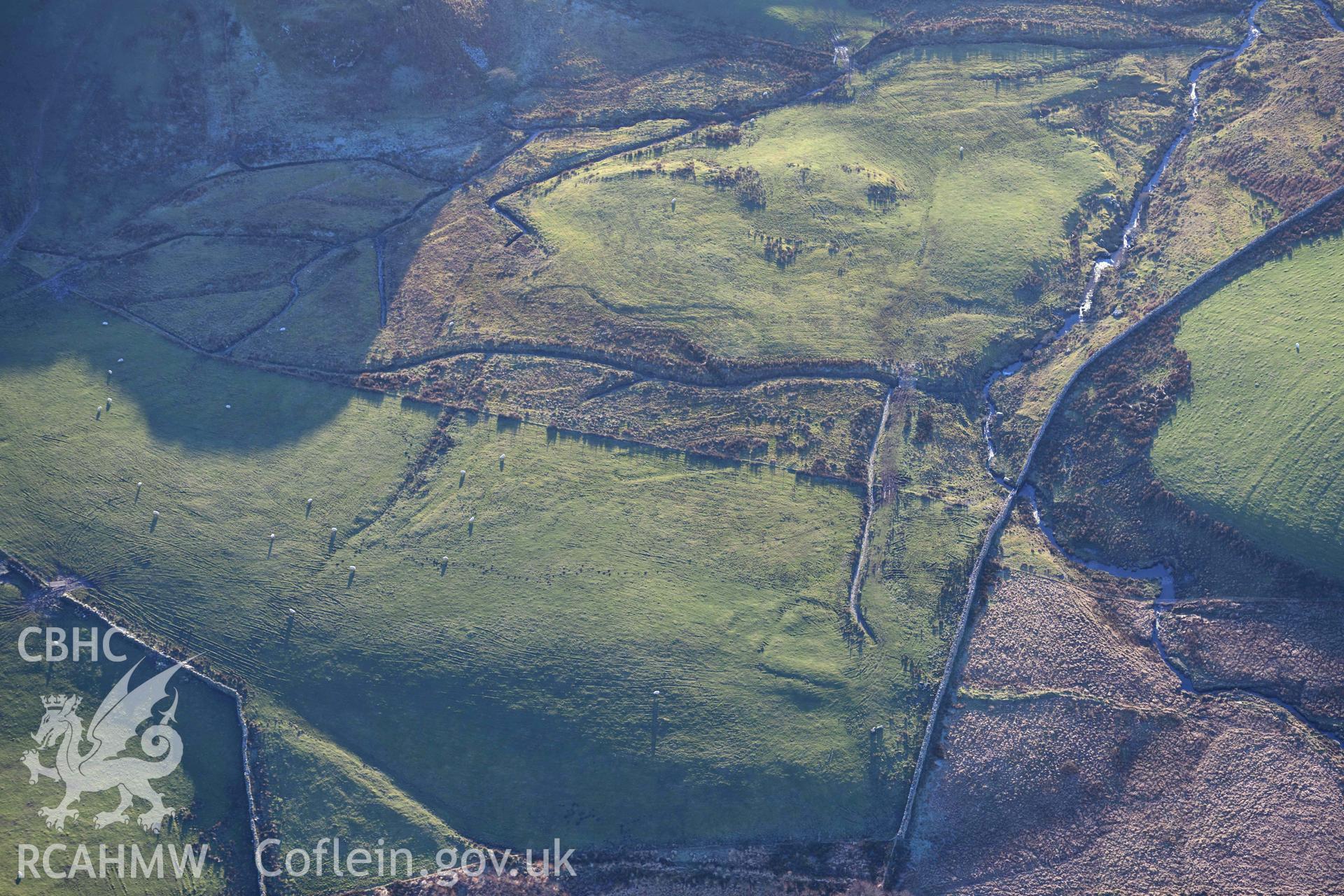 Oblique aerial photograph of Dolbelydr Roman practice camp taken during the Royal Commission’s programme of archaeological aerial reconnaissance by Toby Driver on 17th January 2022
