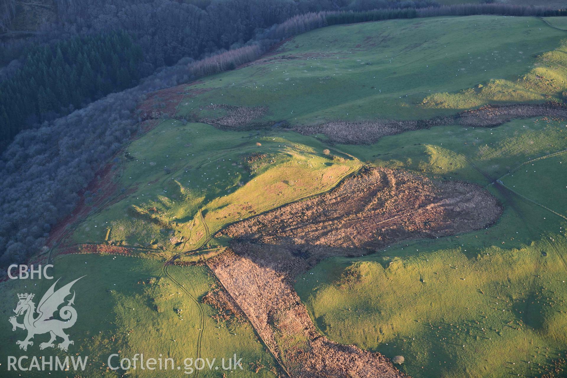 Oblique aerial photograph of Pen Dinas Elerch hillfort taken during the Royal Commission’s programme of archaeological aerial reconnaissance by Toby Driver on 17th January 2022