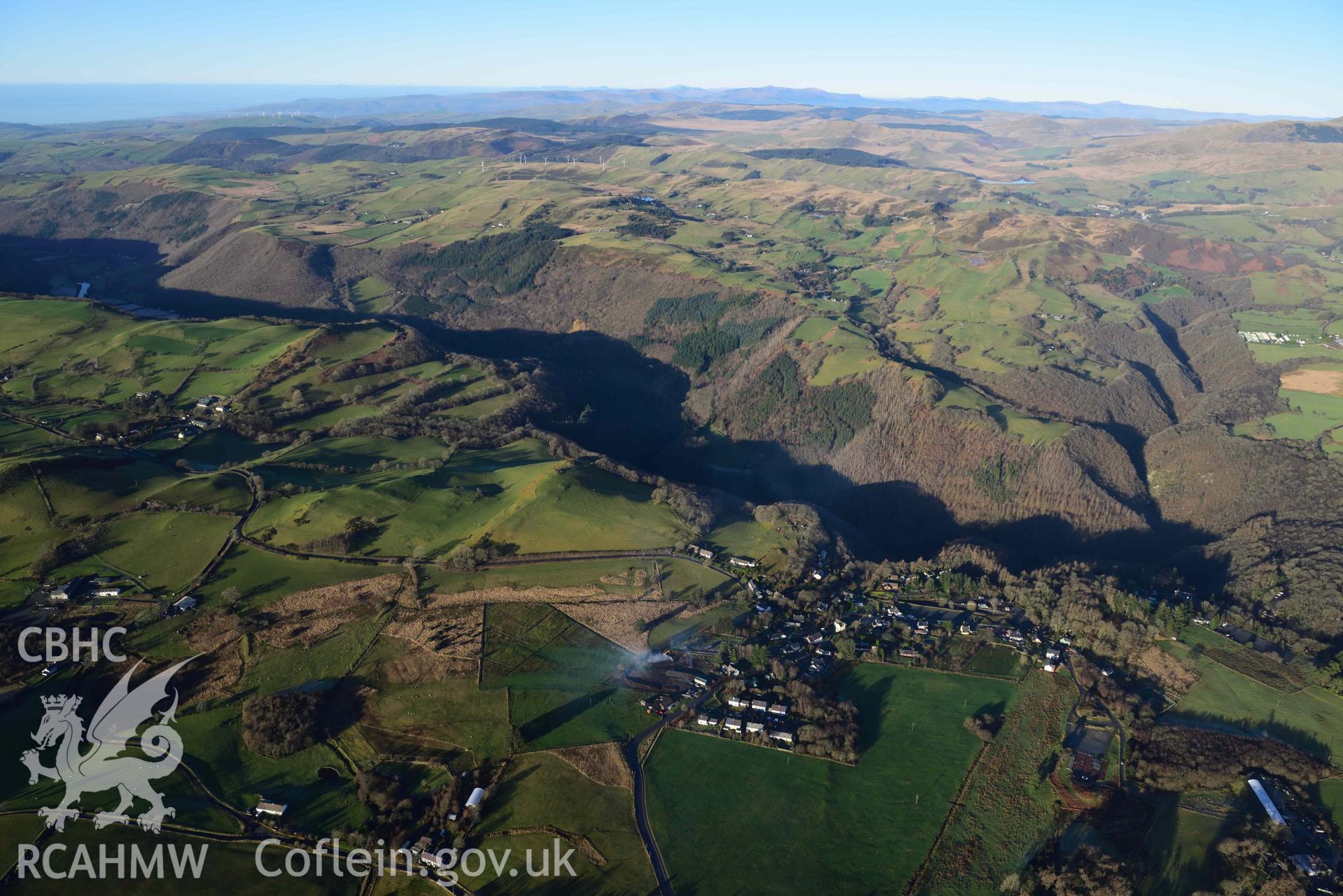 Oblique aerial photograph showing winter landscape of Devils Bridge with Rheidol gorge, from the south. Taken during the Royal Commission’s programme of archaeological aerial reconnaissance by Toby Driver on 17th January 2022