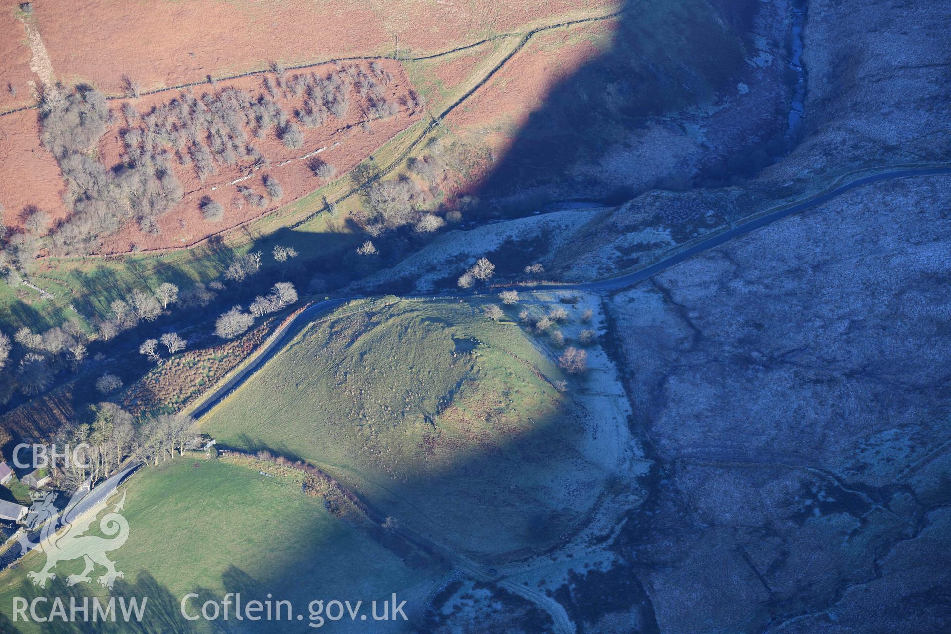 Oblique aerial photograph of Penbryn Cwmystwyth taken during the Royal Commission’s programme of archaeological aerial reconnaissance by Toby Driver on 17th January 2022