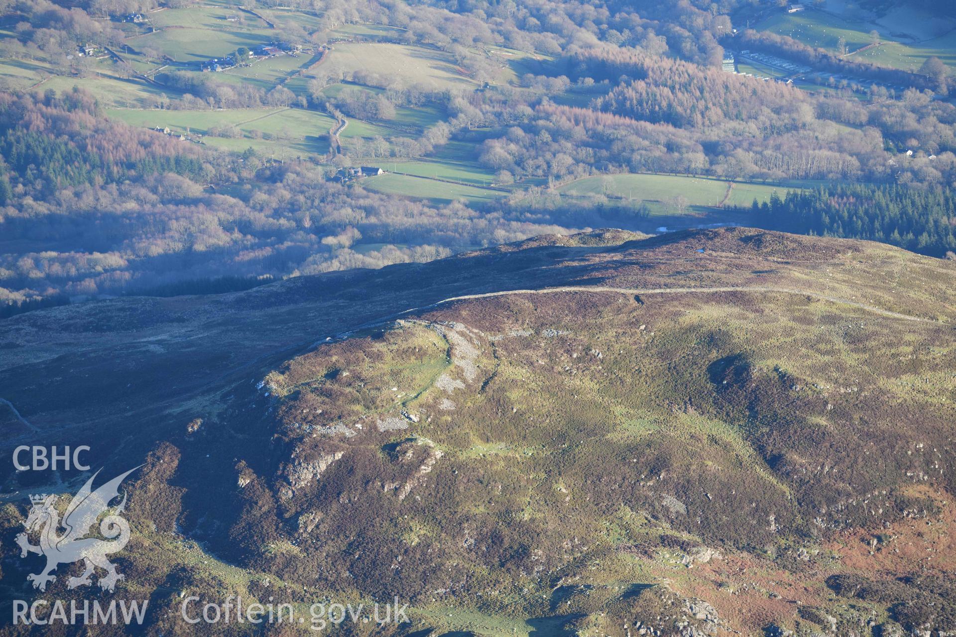 Oblique aerial photograph of Moel Offrwm taken during the Royal Commission’s programme of archaeological aerial reconnaissance by Toby Driver on 17th January 2022