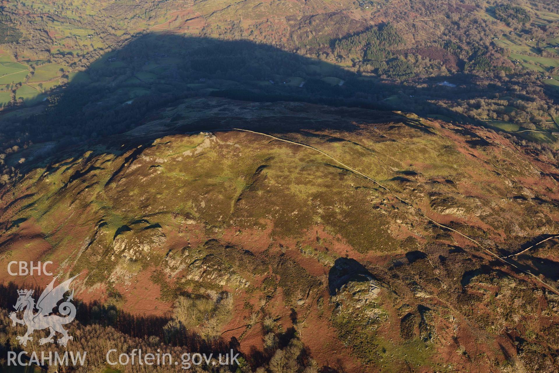 Oblique aerial photograph of Moel Offrwm taken from the west during the Royal Commission’s programme of archaeological aerial reconnaissance by Toby Driver on 17th January 2022