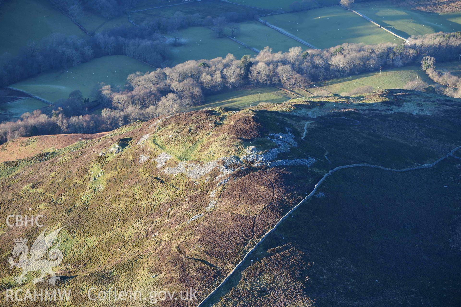 Oblique aerial photograph of Moel Offrwm taken during the Royal Commission’s programme of archaeological aerial reconnaissance by Toby Driver on 17th January 2022