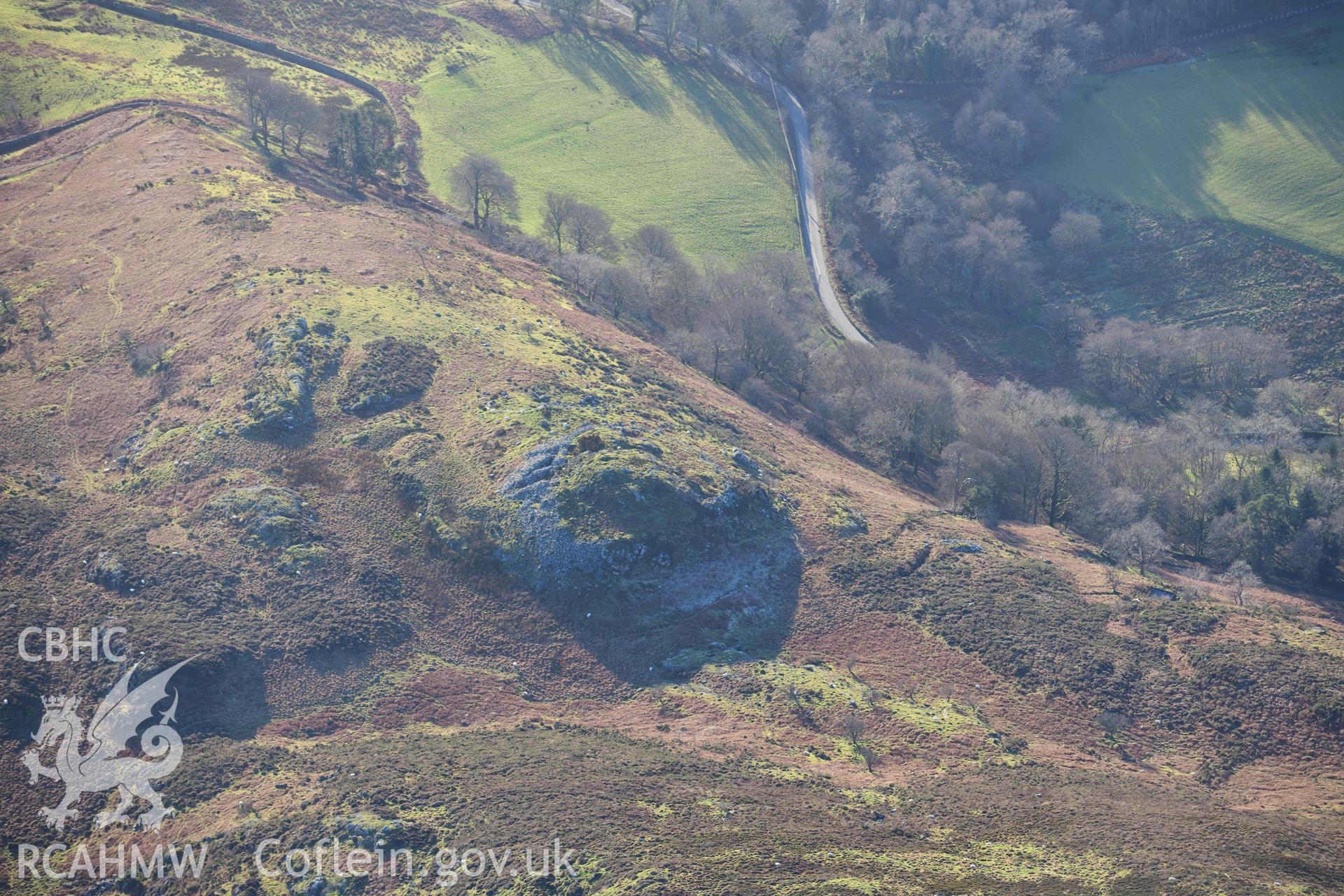 Oblique aerial photograph of Moel Offrwm lower hillfort taken during the Royal Commission’s programme of archaeological aerial reconnaissance by Toby Driver on 17th January 2022