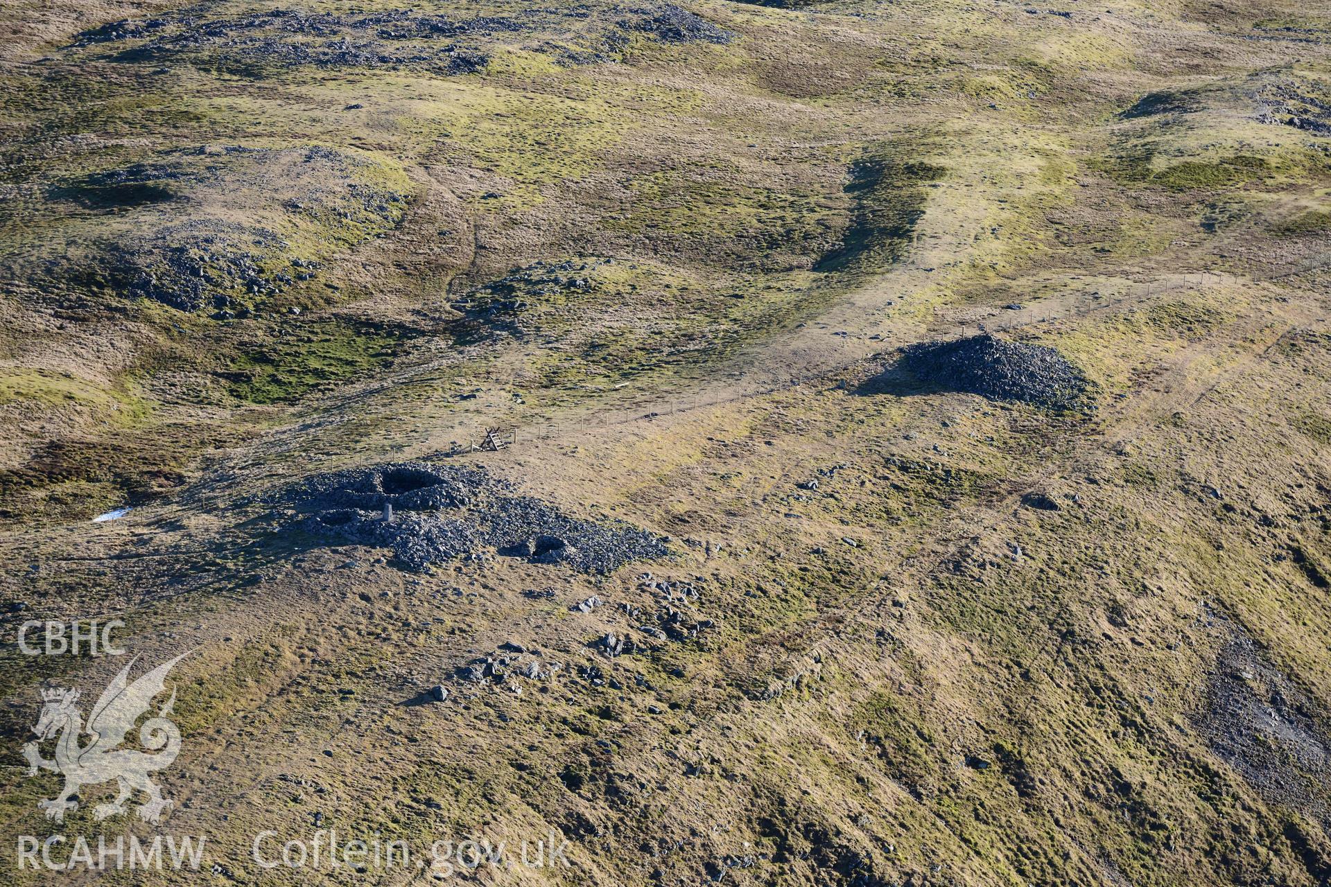 Oblique aerial photograph of Pen Plynlimon Fawr cairn cemetery. Taken during the Royal Commission’s programme of archaeological aerial reconnaissance by Toby Driver on 17th January 2022
