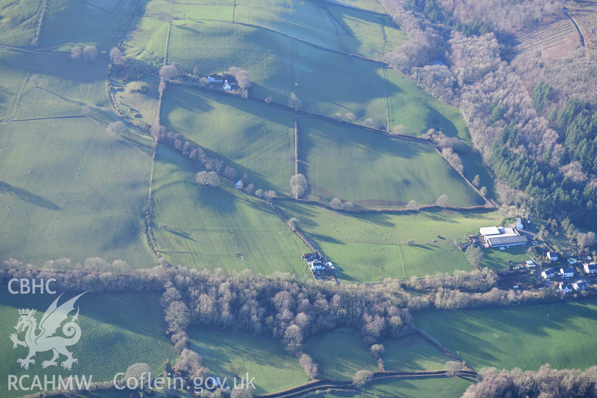 Oblique aerial photograph of Hendre Villa Roman road taken during the Royal Commission’s programme of archaeological aerial reconnaissance by Toby Driver on 17th January 2022