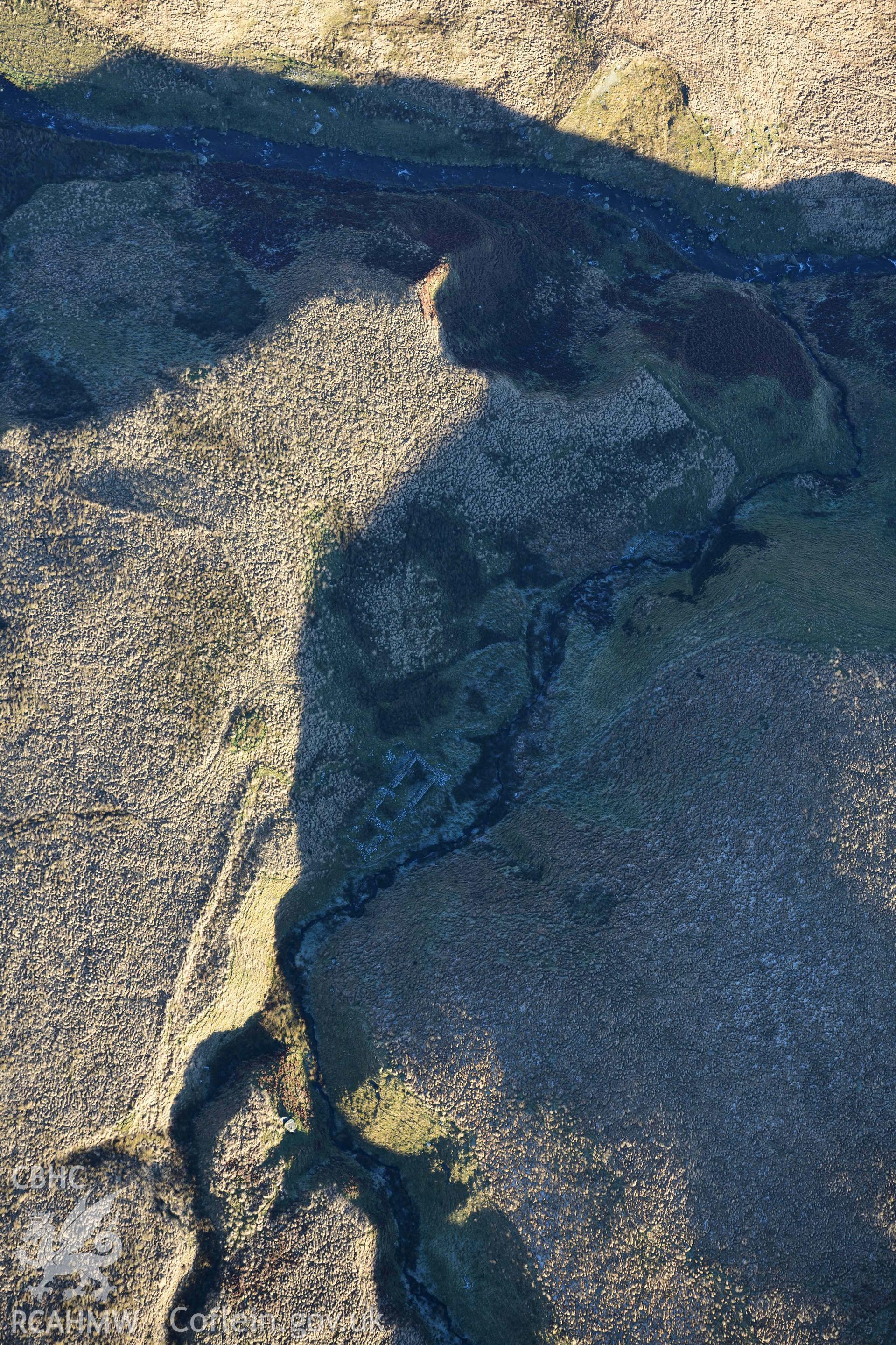 Oblique aerial photographic survey of Nant y Gafod deserted rural settlement taken during the Royal Commission’s programme of archaeological aerial reconnaissance by Toby Driver on 17th January 2022