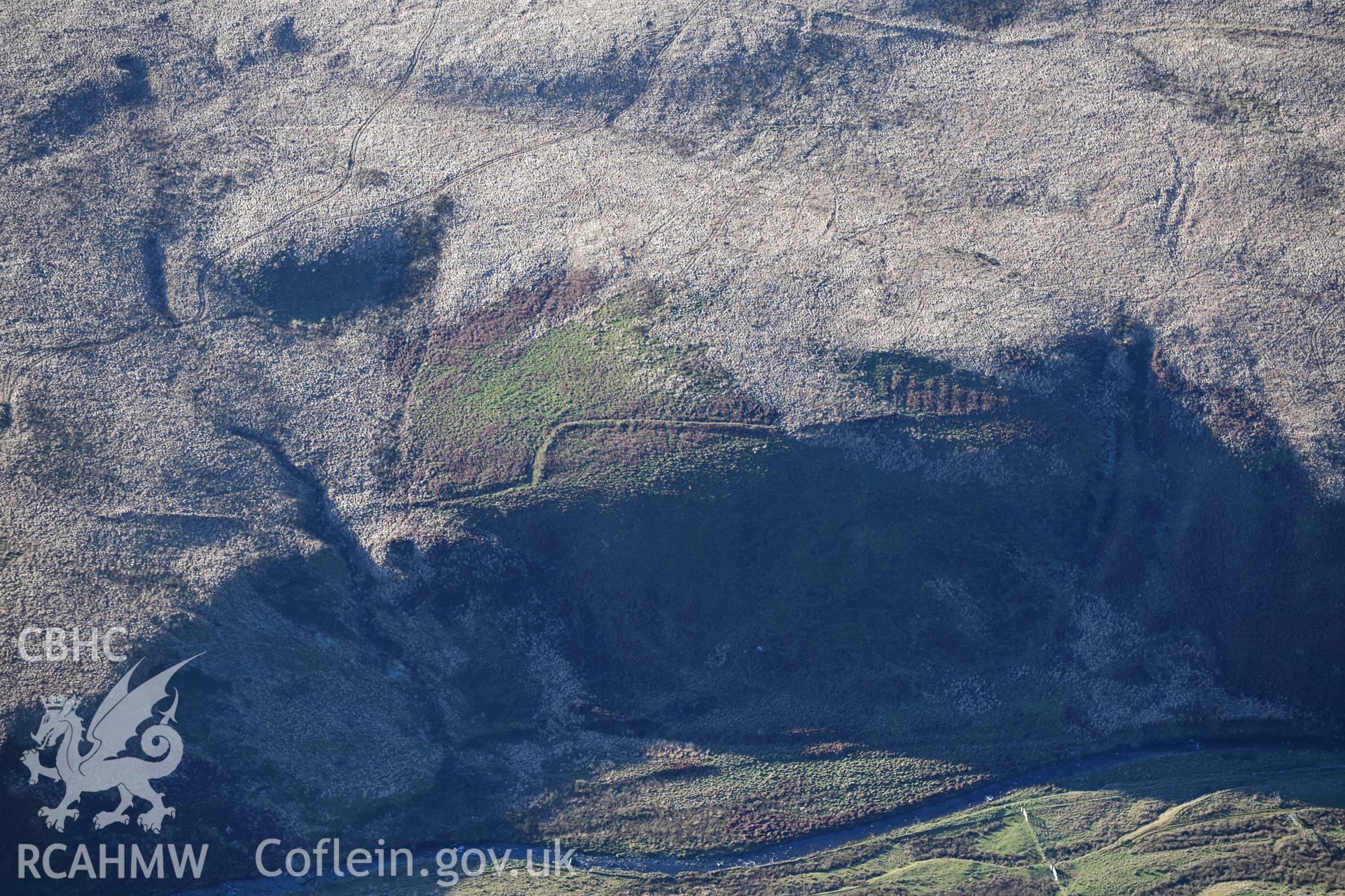 Oblique aerial photograph of cultivation features at Lluest Dolgwiail taken during the Royal Commission’s programme of archaeological aerial reconnaissance by Toby Driver on 17th January 2022