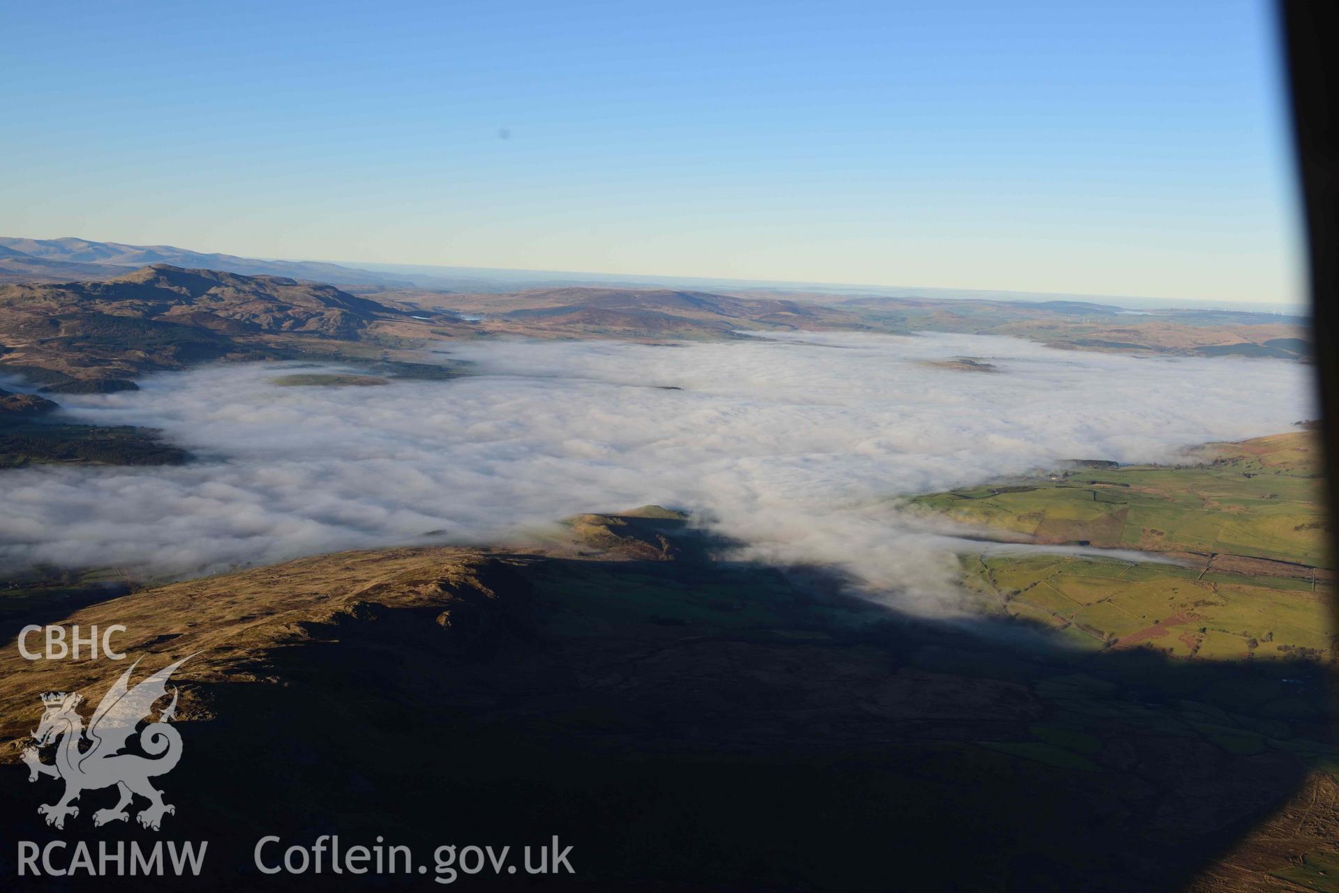 Oblique aerial photograph showing view from the south west of cloud inversion over Llyn Tegid/Bala Lake. Taken during the Royal Commission’s programme of archaeological aerial reconnaissance by Toby Driver on 17th January 2022