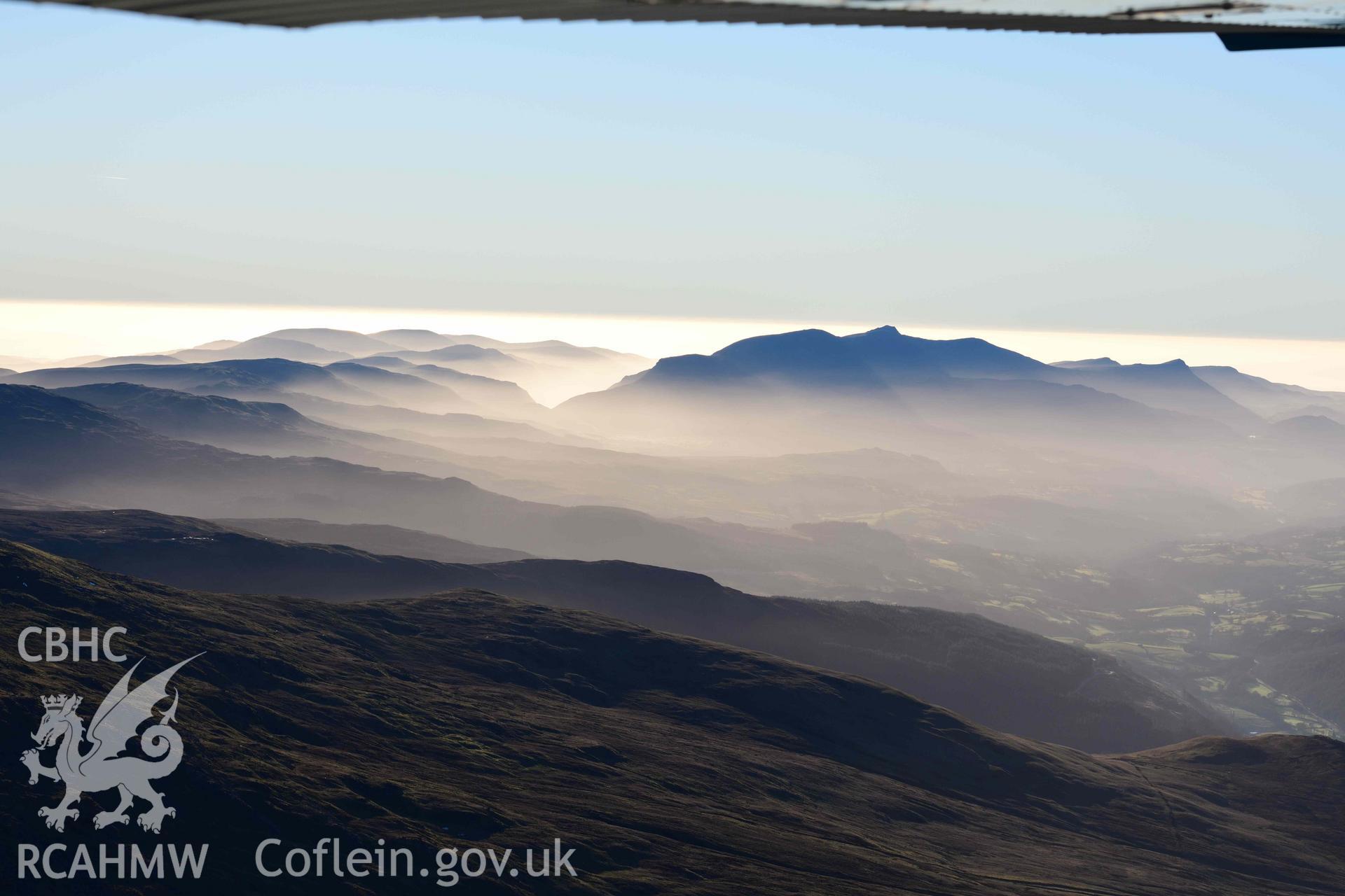 Oblique aerial photograph of Cader Idris winter landscape taken from the north east during the Royal Commission’s programme of archaeological aerial reconnaissance by Toby Driver on 17th January 2022