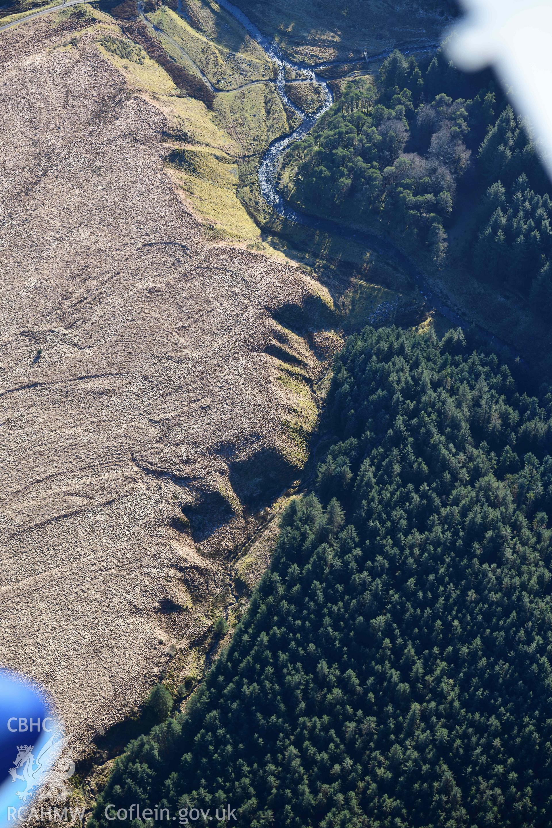 Oblique aerial photograph of post medieval peat cutting at Lluest Dolgwiail taken during the Royal Commission’s programme of archaeological aerial reconnaissance by Toby Driver on 17th January 2022