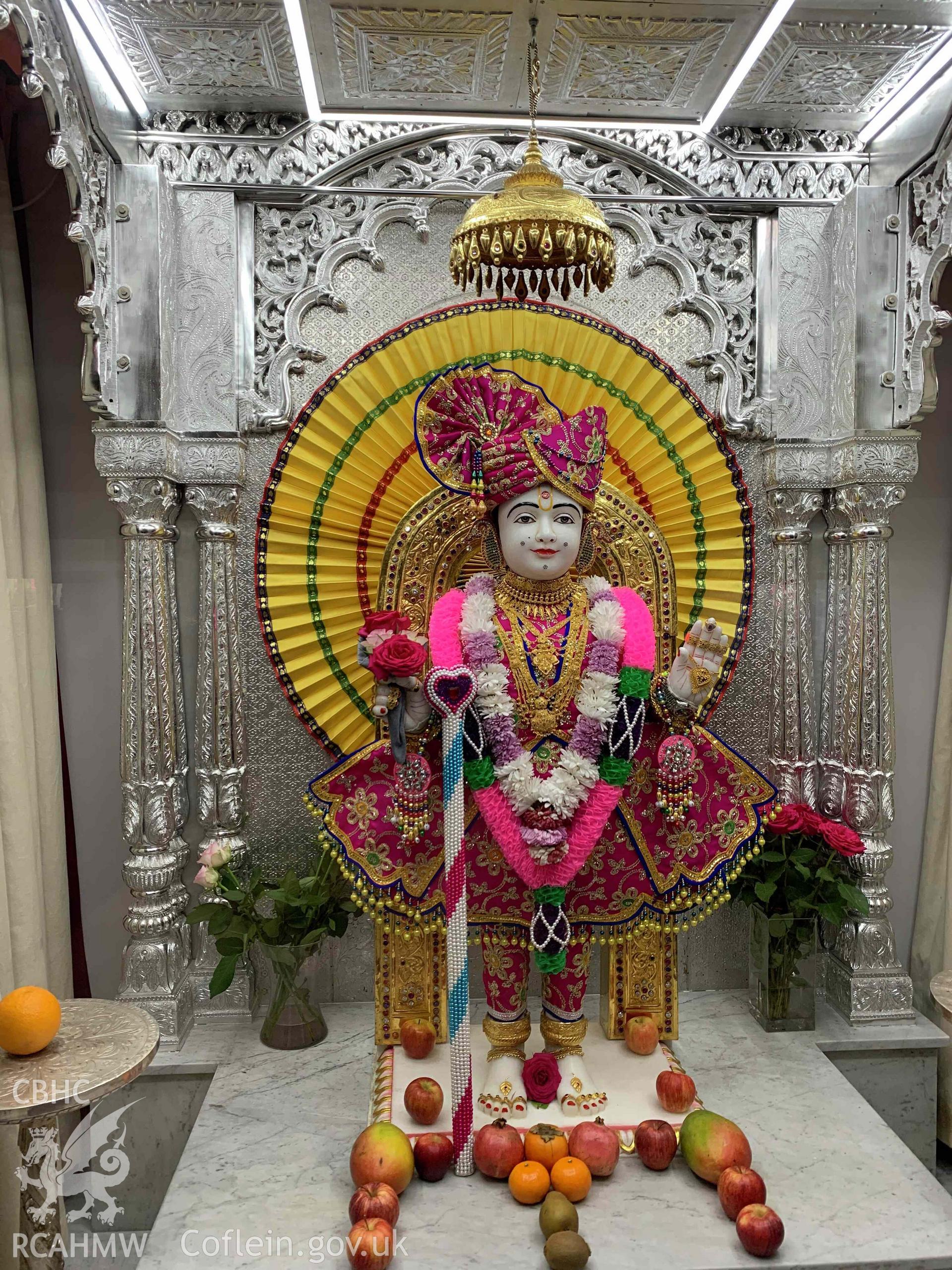 Photograph showing the central shrine is devoted to the founder of the Swaminarayan religion, in Shri Swaminaryan temple, Cardiff, taken in November 2021.