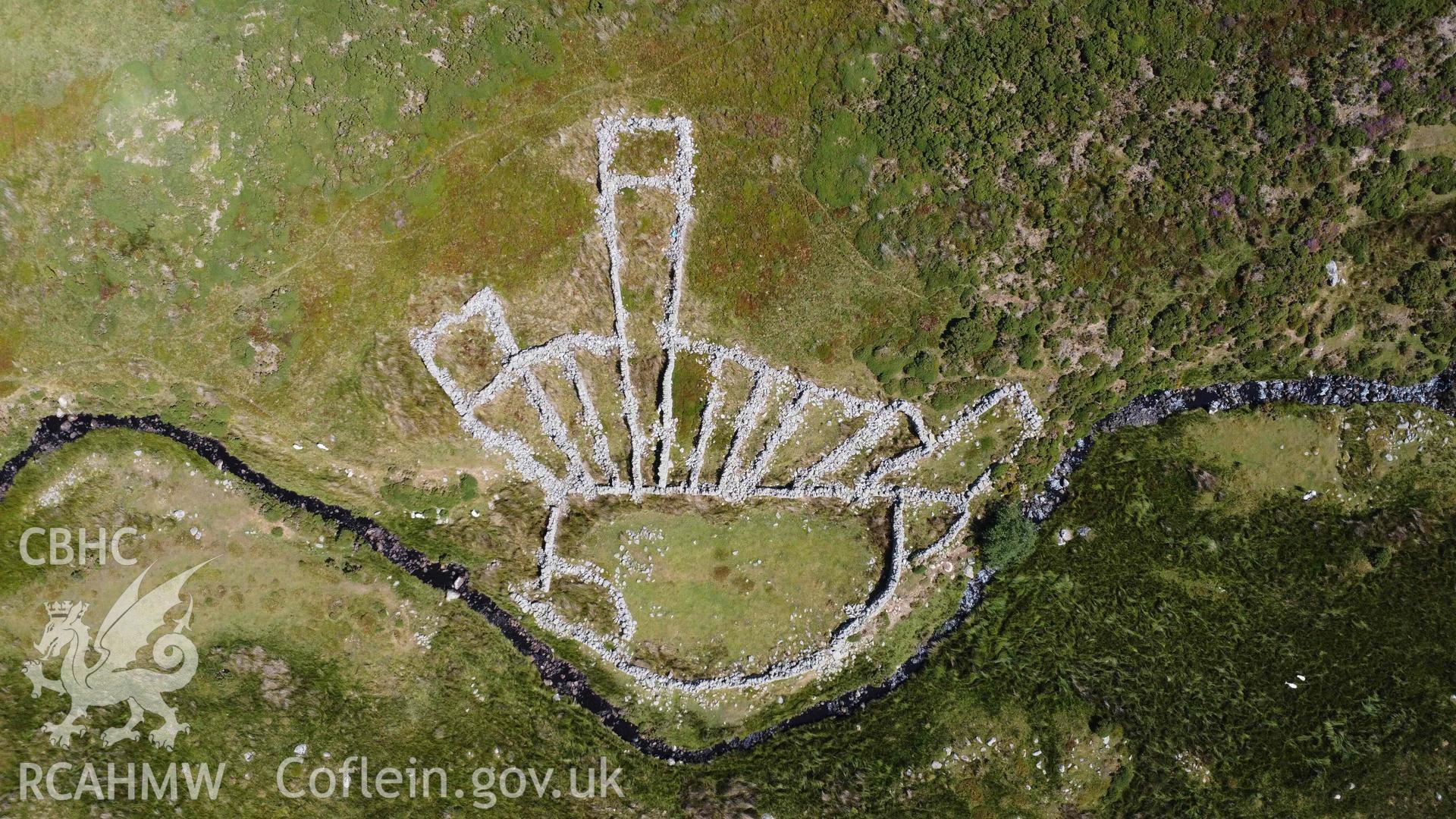 Digital aerial photograph showing multicellular sheepfold, Maen Crwn. Taken in July 2023 by John Rowlands.