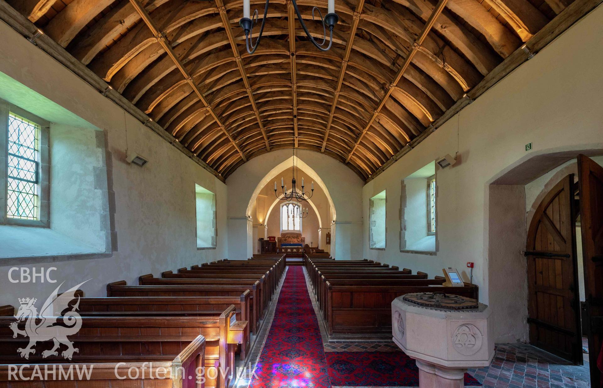 St Michael's Church, Llanfihangel y Creuddyn. Interior view along nave to chancel.
