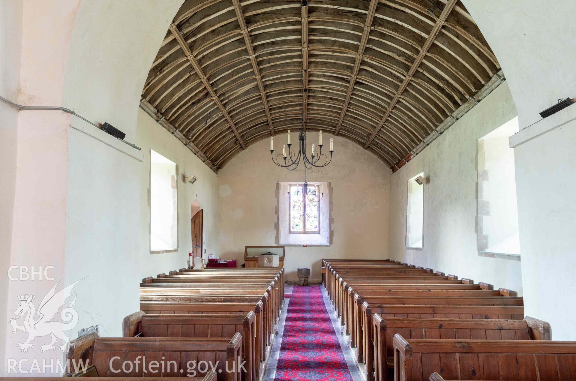 St Michael's Church, Llanfihangel y Creuddyn. Interior view along nave to west window.