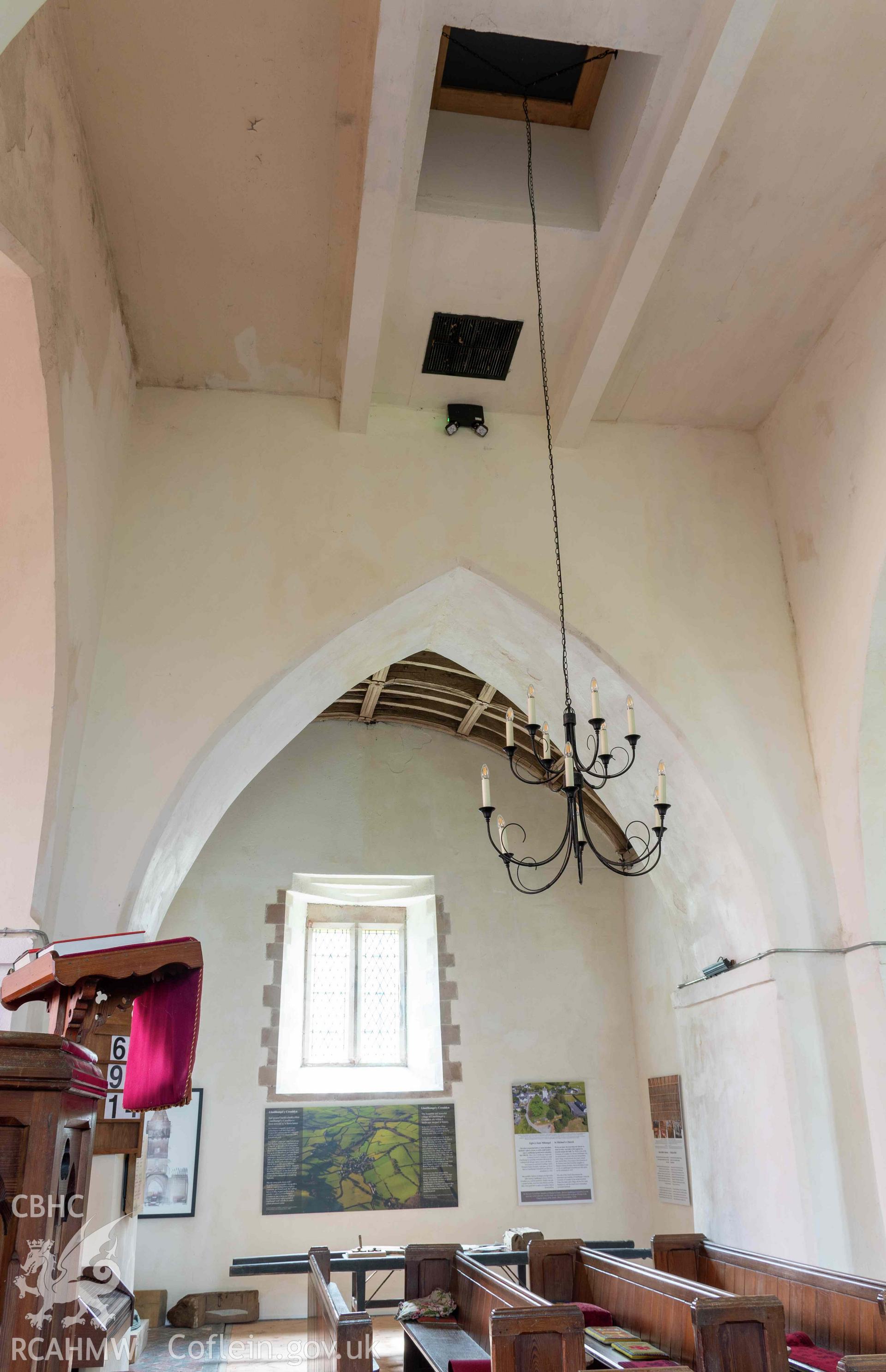 St Michael's Church, Llanfihangel y Creuddyn. Interior view. Crossing looking up to access hatch into tower.