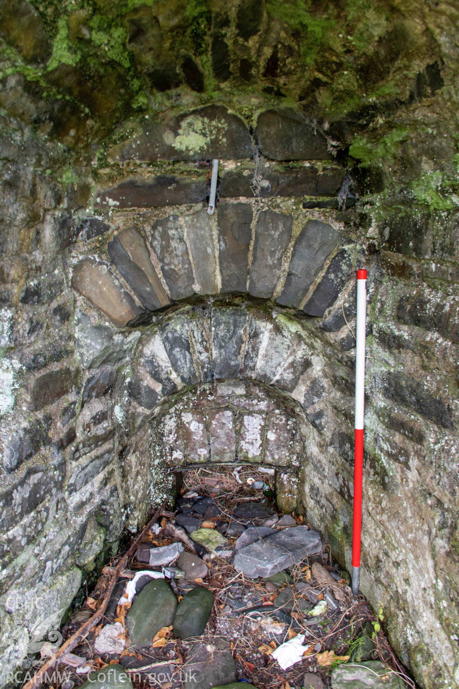 Wallog Limekiln. Draw-hole, north kiln-eye (with scale).
