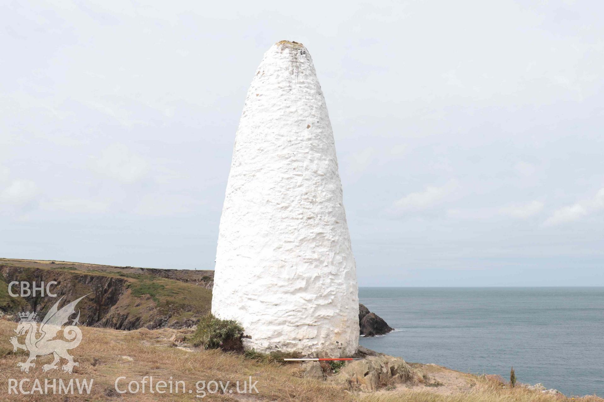 The eastern navigation marker at Porthgain, view looking west on 06/07/2023.