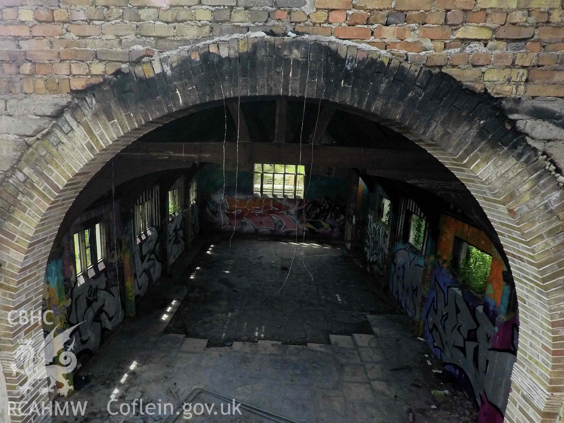 Elevated interior of church. Chancel arch looking to the west end. St Athan Boys Village.
