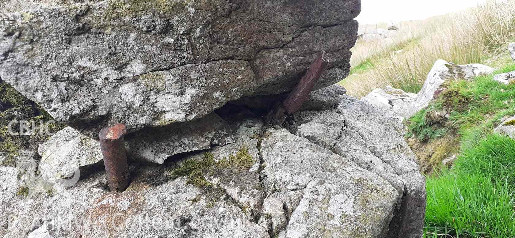 Digital photograph showing iron rod used in construction of a multicellular sheepfold near Bethesda. Taken in August 2023 by John Rowlands.