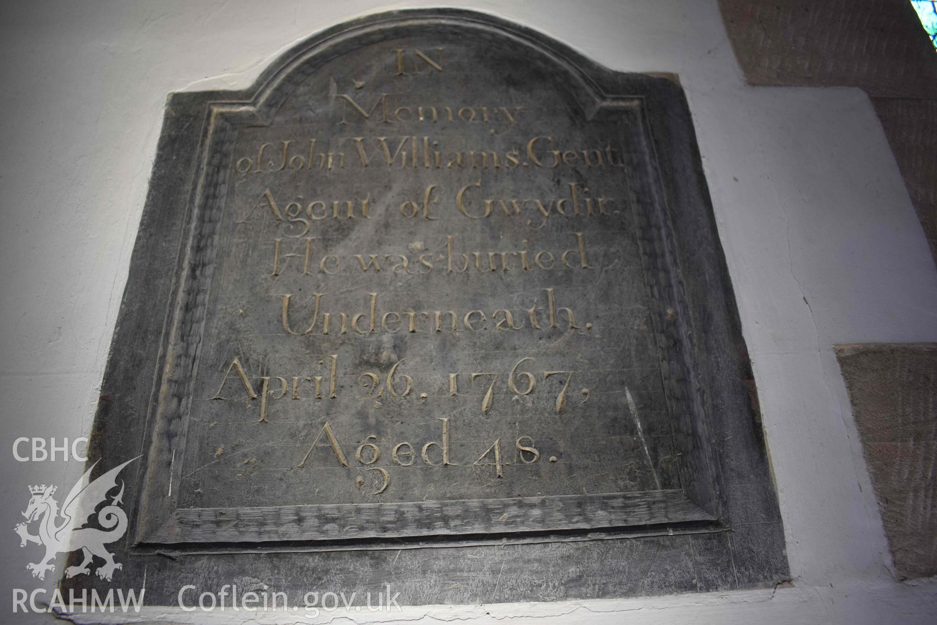 Photograph showing John Willliams memorial plaque on the wall of the north aisle. taken during an Archaeological Watching Brief carried out during refurbishment works at St Grwst’s Church and Gwydir Chapel, Llanrwst,, by Clwyd-Powys Archaeological Trust in 2019-2020. ref: CPAT 4679-0075., Project no. 2399.