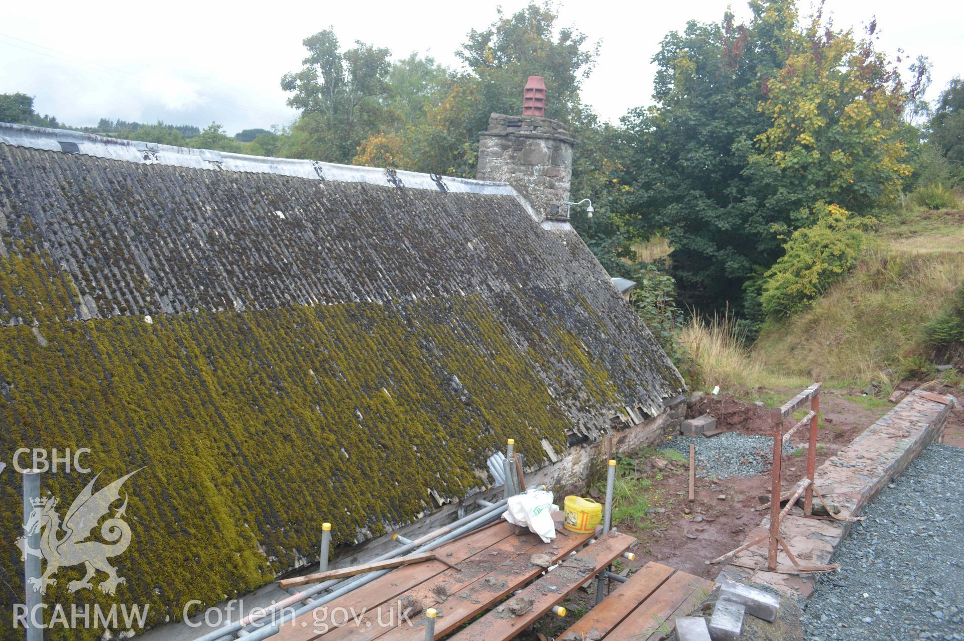 Photograph showing Exterior view of E roof of house, from a Level 3 historic building recording of Felincamlais Farm, Libanus, carried out by Clwyd-Powys Archaeological Trust in 2022. Report no: 1899, Project no. 2651.