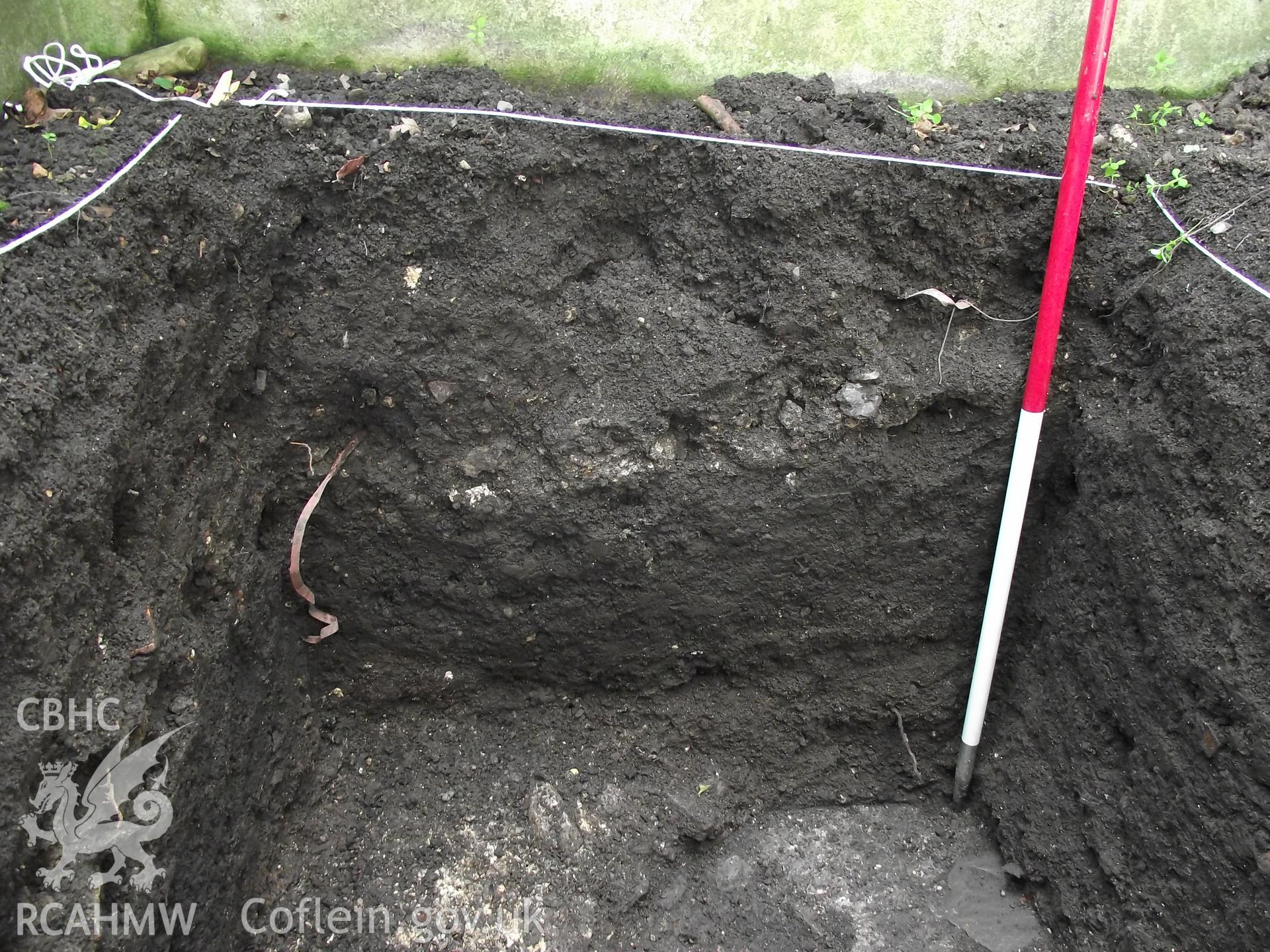 Digital photograph showing excavated area at 1A White Hart Lane and 30 High Street (Bank House), Caerleon. Produced by M. Lewis, National Roman Legion Museum. August 2012.