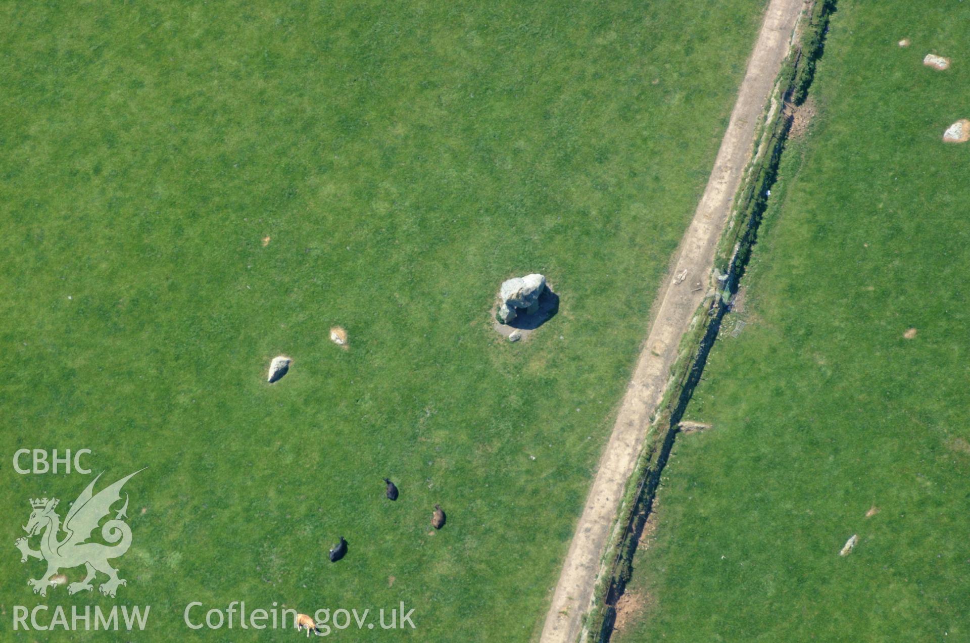 RCAHMW colour oblique aerial photograph of Carreg Samson Burial Chamber taken on 25/05/2004 by Toby Driver