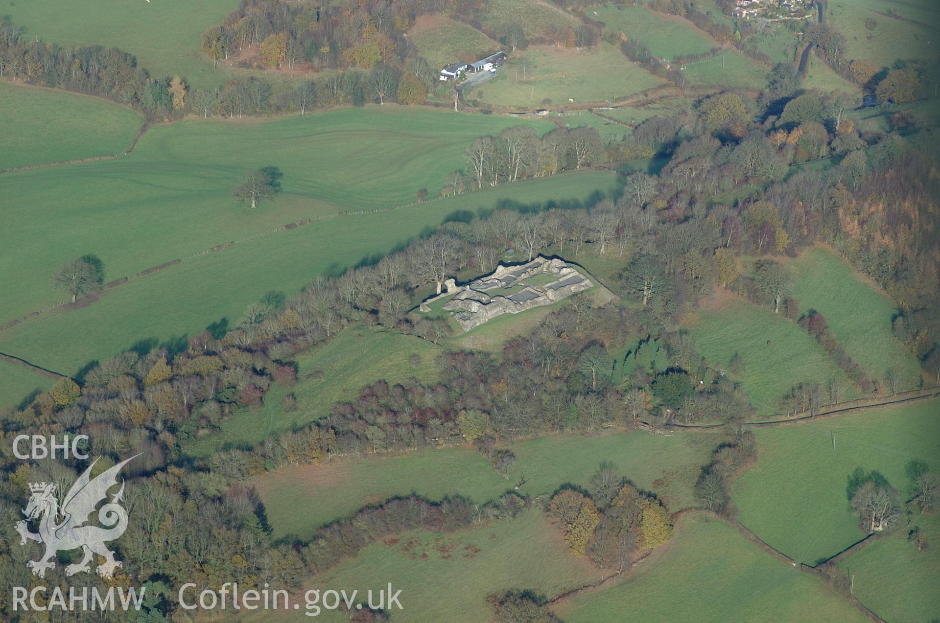 RCAHMW colour oblique aerial photograph of Dolforwyn Castle, Abermule. A distant view from the south. Taken on 19 November 2004 by Toby Driver