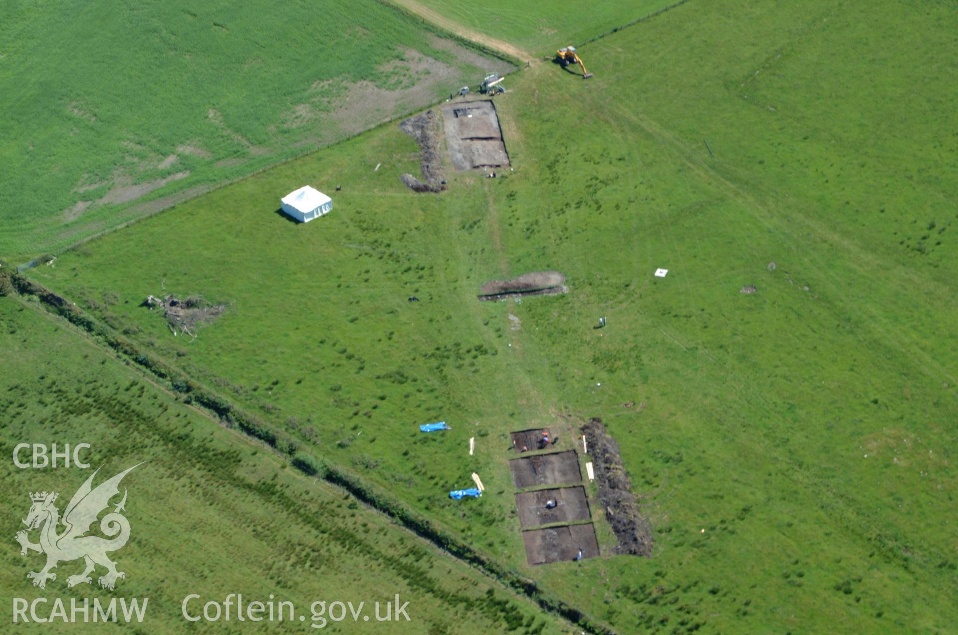 RCAHMW colour oblique aerial photograph of Llangynfelin Timber Trackway taken on 14/06/2004 by Toby Driver