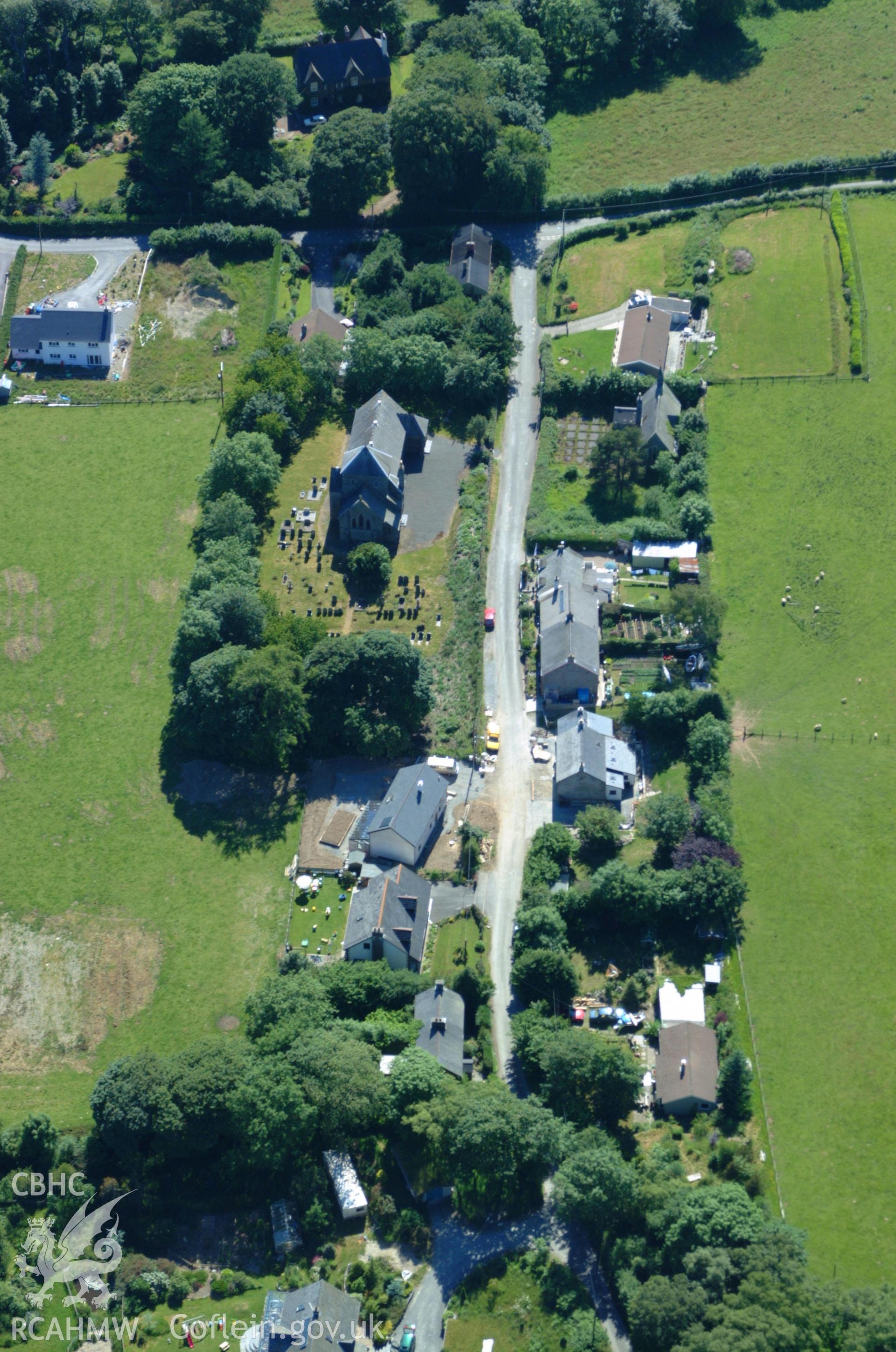 RCAHMW colour oblique aerial photograph of St Peter's Church, Bont-goch (Elerch) taken on 14/06/2004 by Toby Driver